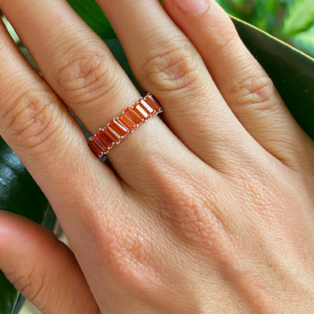 For Sale:   Orange Bullet Sapphire Fire Coral Eternity Ring - 18kt 2