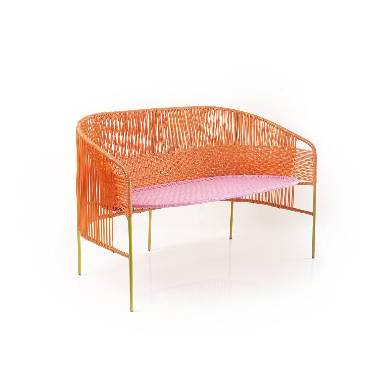 Orange caribe 2 seater bank by Sebastian Herkner
Materials: Galvanized and powder-coated tubular steel. PVC strings are made from recycled plastic.
Technique: Made from recycled plastic and weaved by local craftspeople in Colombia. 
Dimensions: W