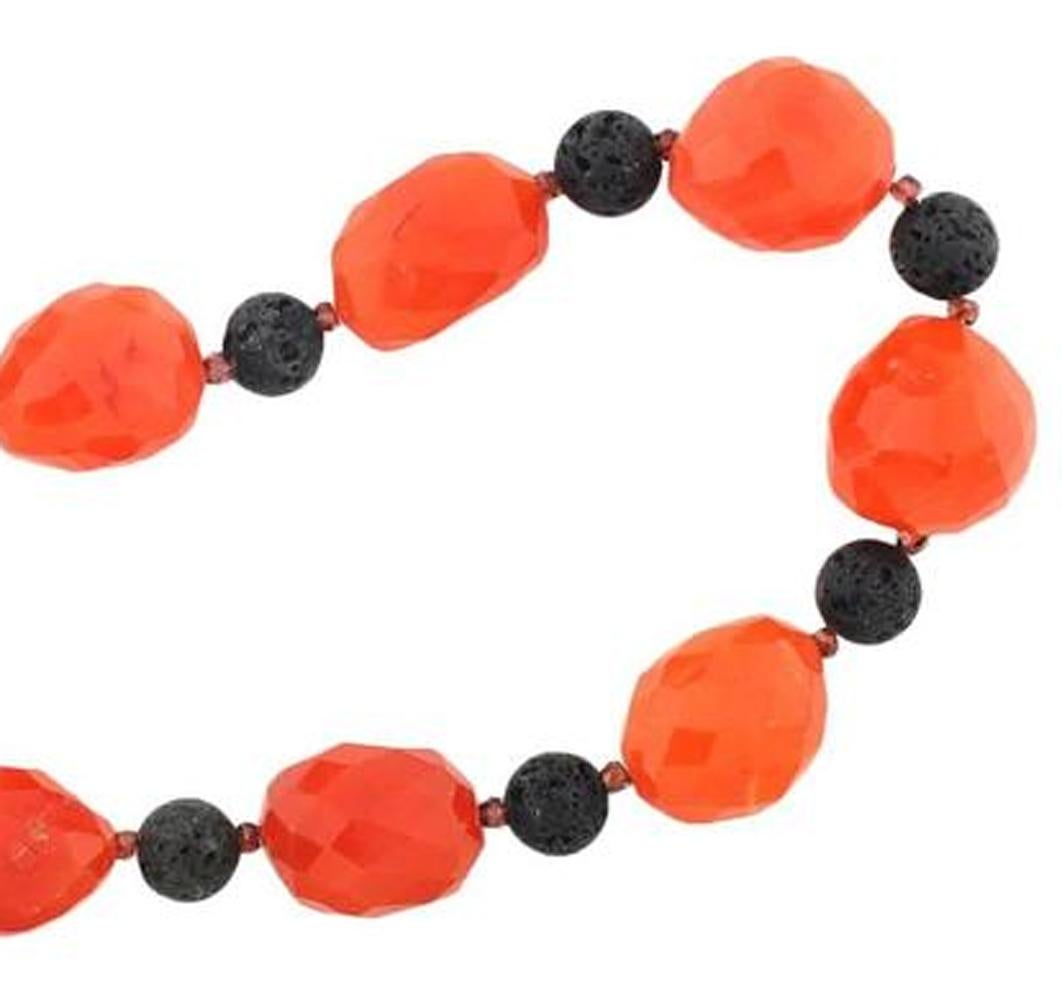 Unique huge big checkerboard gem cut Carnelian rock gems enhanced with natural round black Lava and Hessonite Garnet accents handmade necklace
Size:  Carnelian slightly graduated up to approximately 20 mm
Length:  23 inches; Clasp:  Vermeil (gold