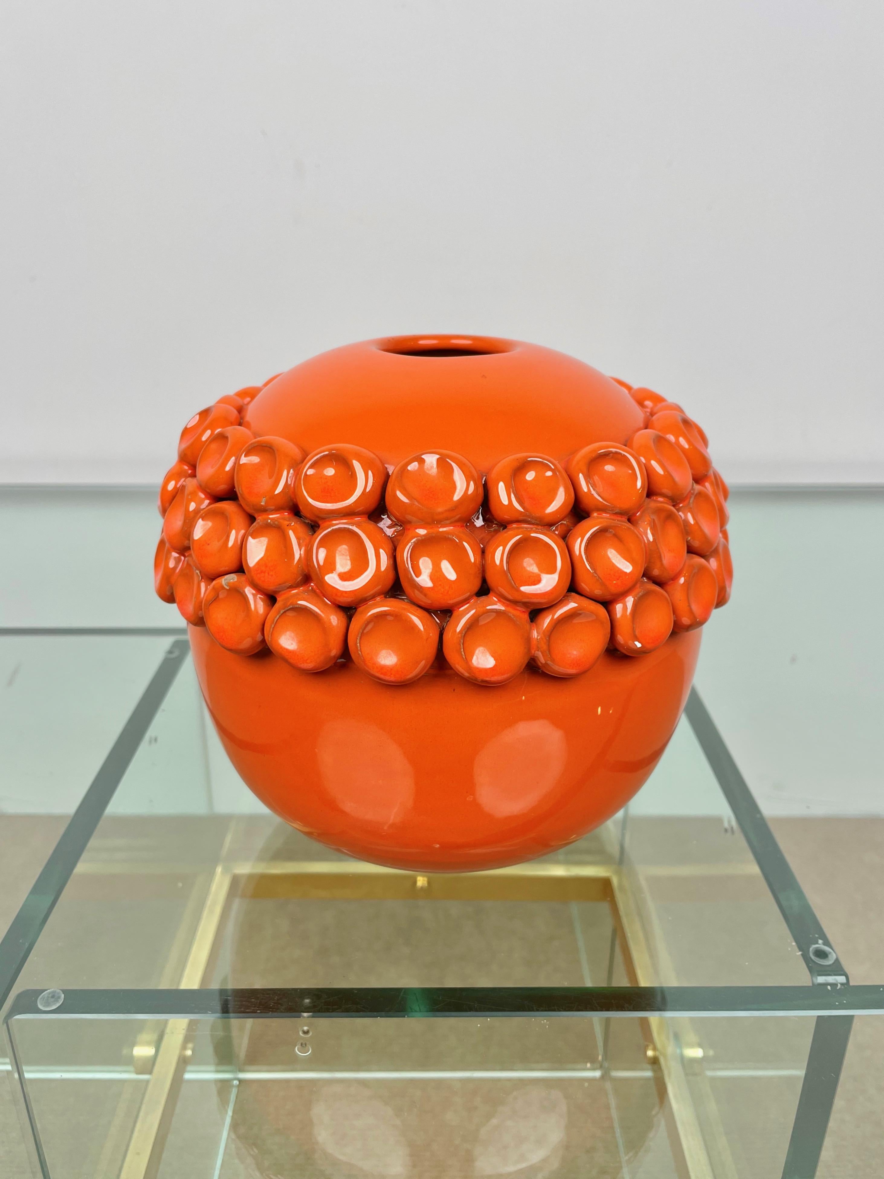Orange ceramic vase by the Italian designer Enzo Bioli for IL PICCHIO. Made in Italy in the 1960s.

The original signature is still visible on the bottom, as shown in the pictures.