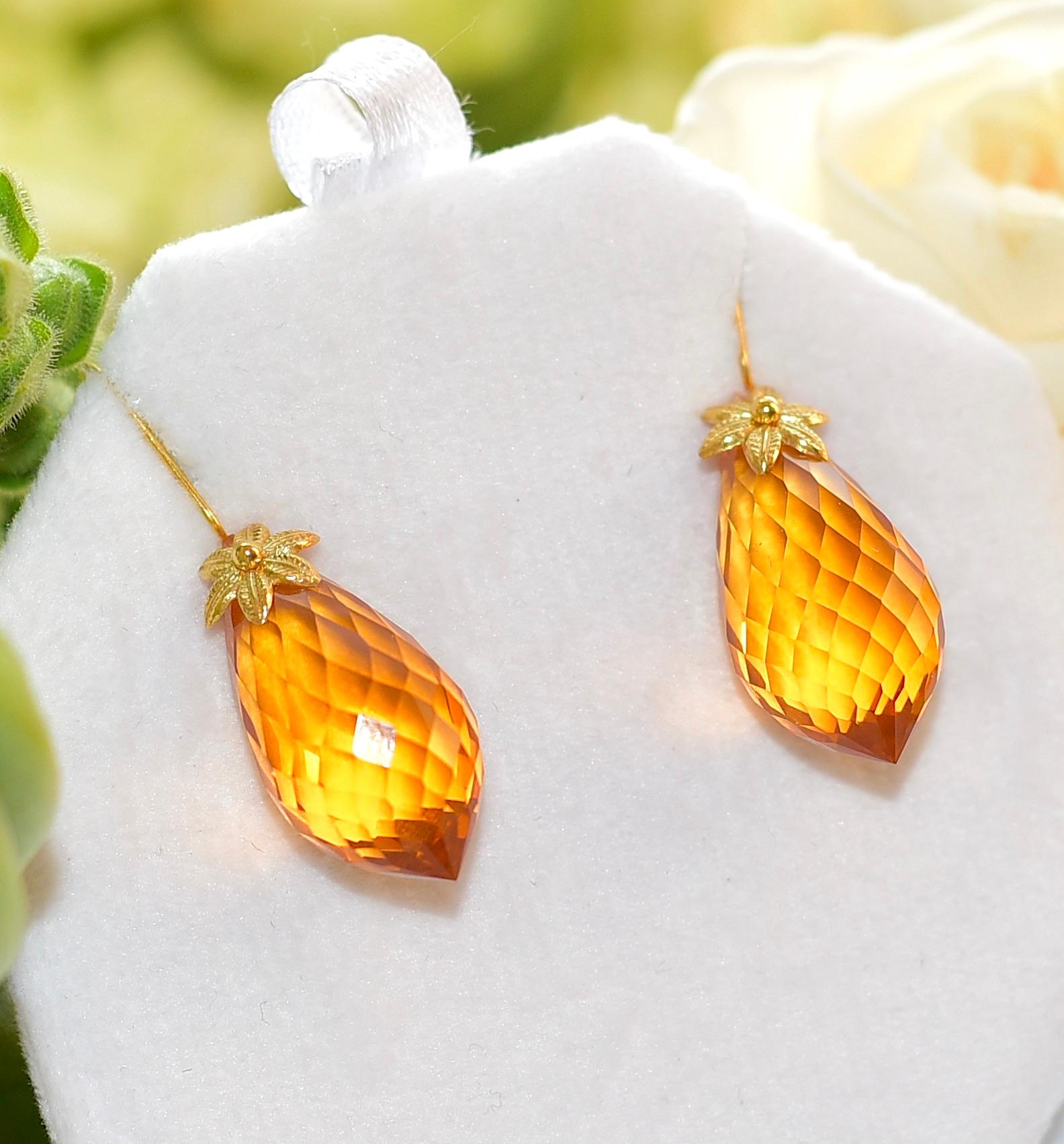 This unique pair of lab-created Brazilian Orange Citrine (21mm x 14mm) earrings is like a goddess! 18K Solid Yellow Gold delicate details give the earrings a feminine look. Simple sophistication for your everyday accessories! The perfect gift!