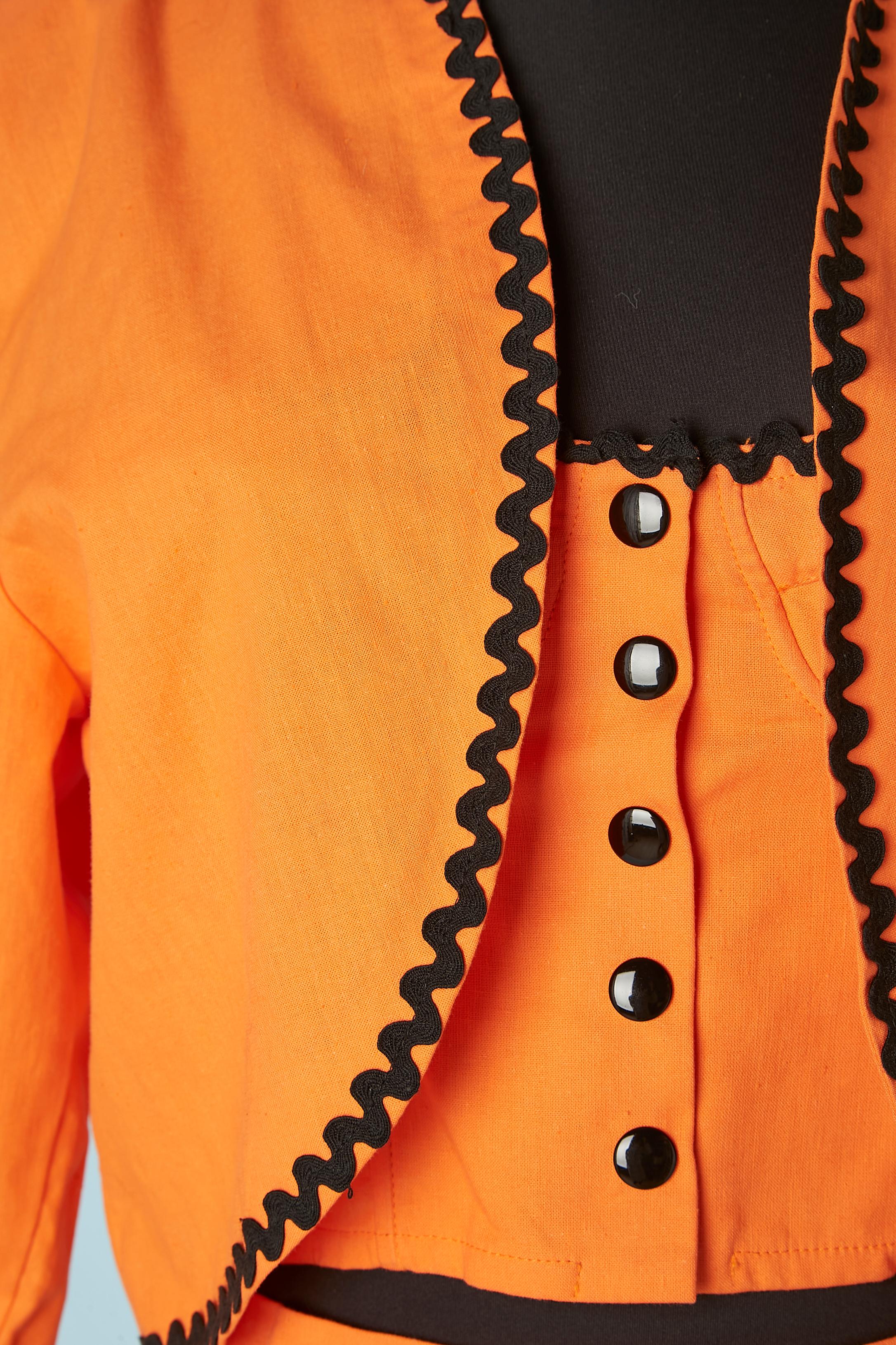 Orange cotton ensemble (boléro, bustier and trouser) with black 