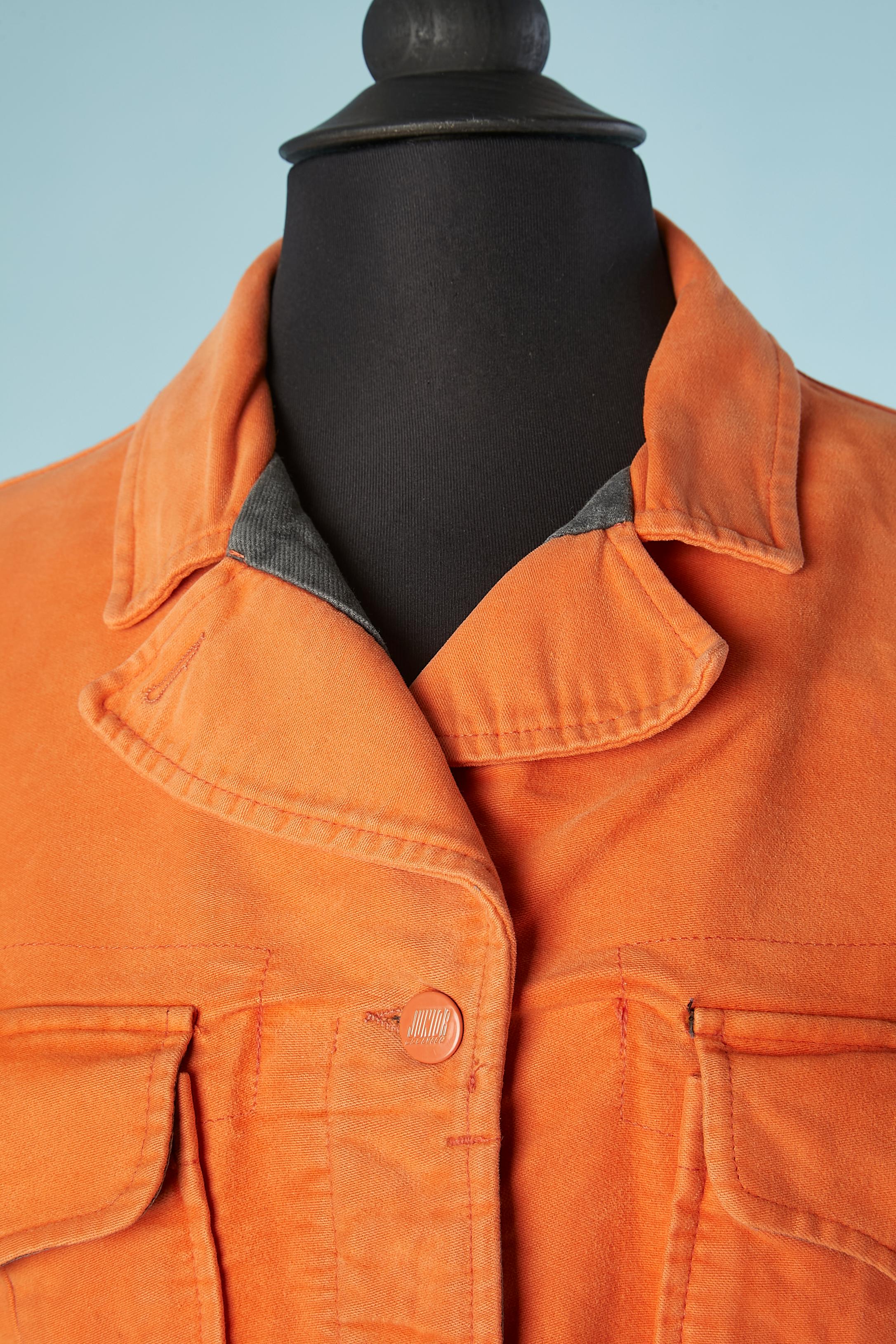 Orange cotton jacket with branded white enamel plaque. 
Fabric composition: 90% cotton, 10% polyurethane.
SIZE 42(It) 38 (Fr) S/M 