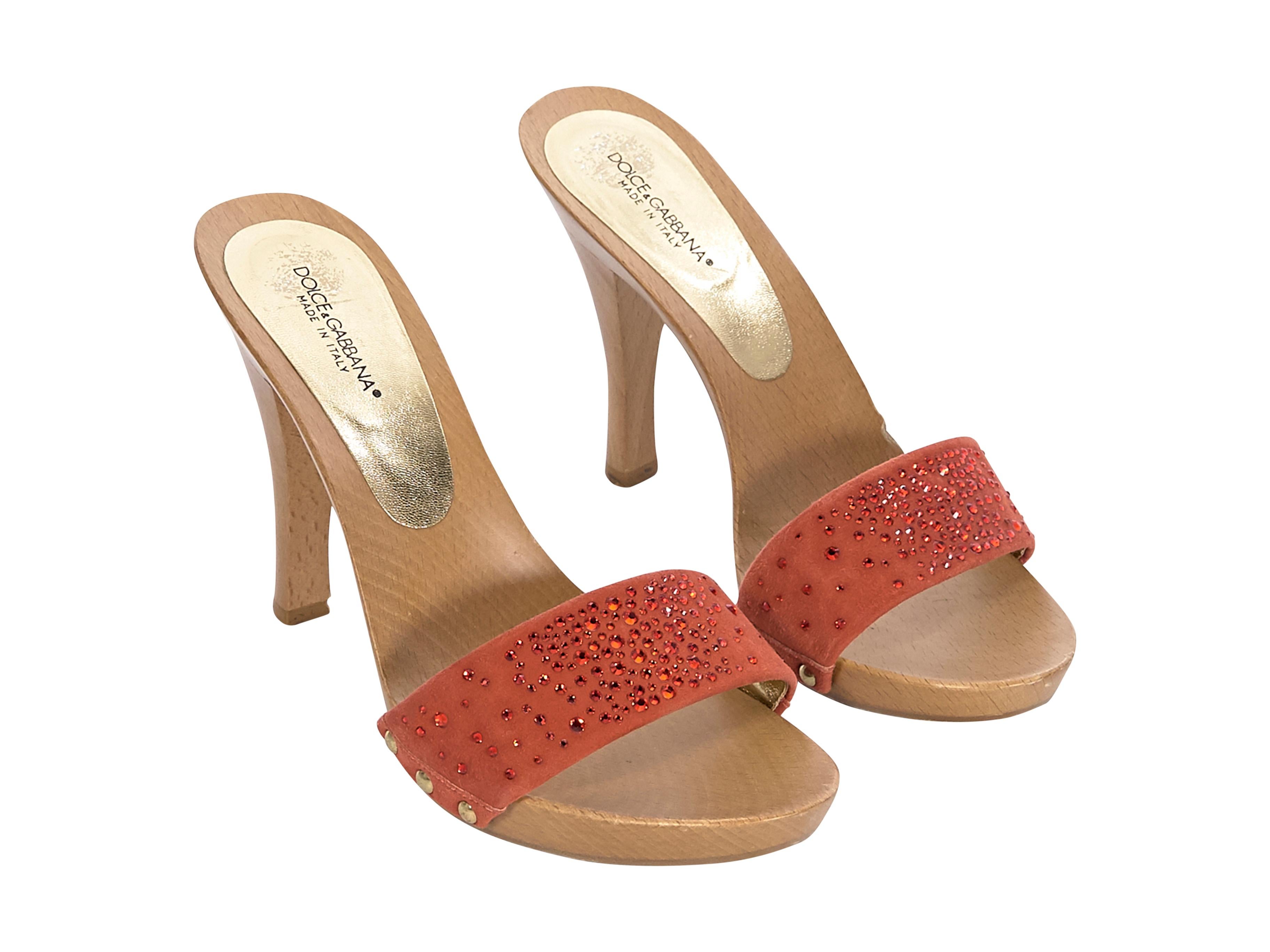 Product details:  Orange suede mule sandals by Dolce & Gabbana.  Embellished with crystals.  Open toe.  Slip-on style.  4