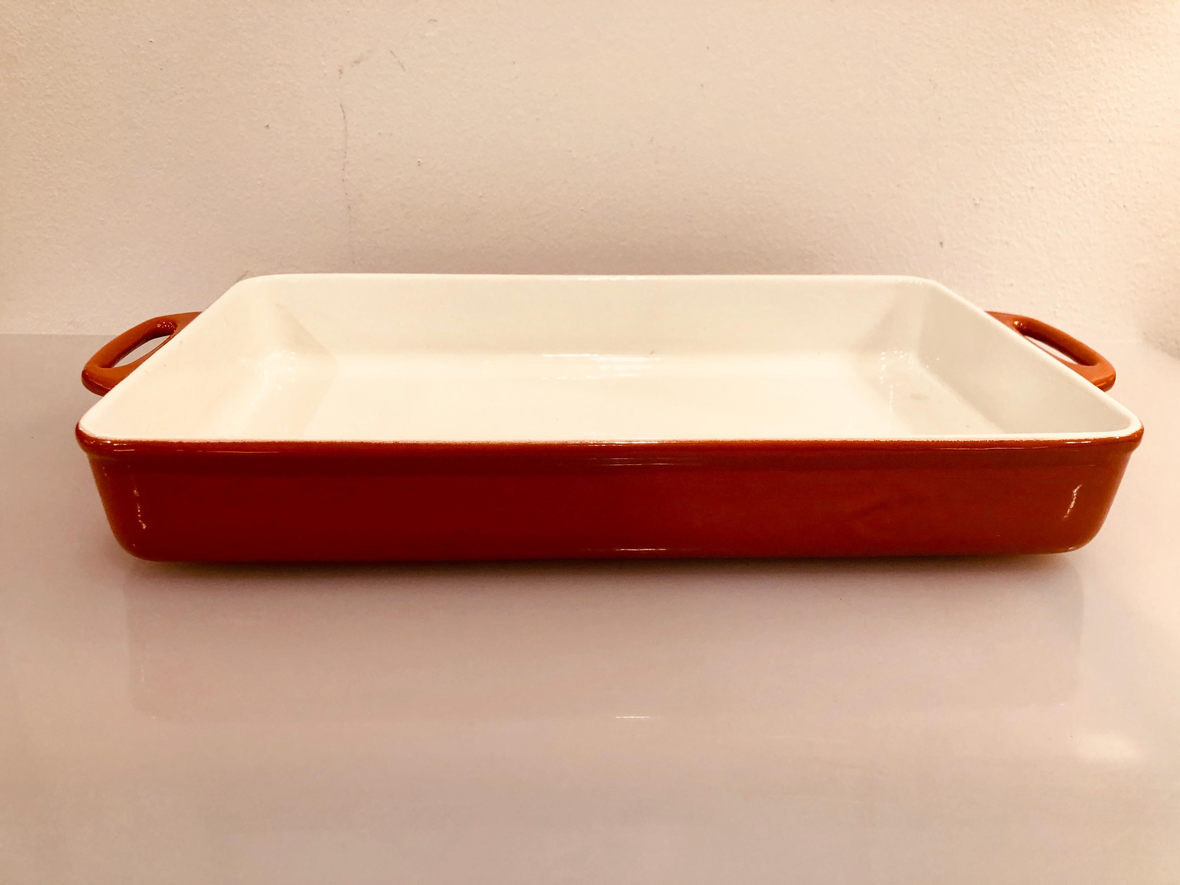 Beautiful Danish cast iron casserole designed by Michael Lax for Copco, condition it’s superb like new no chips cracks, or even used, nice color.