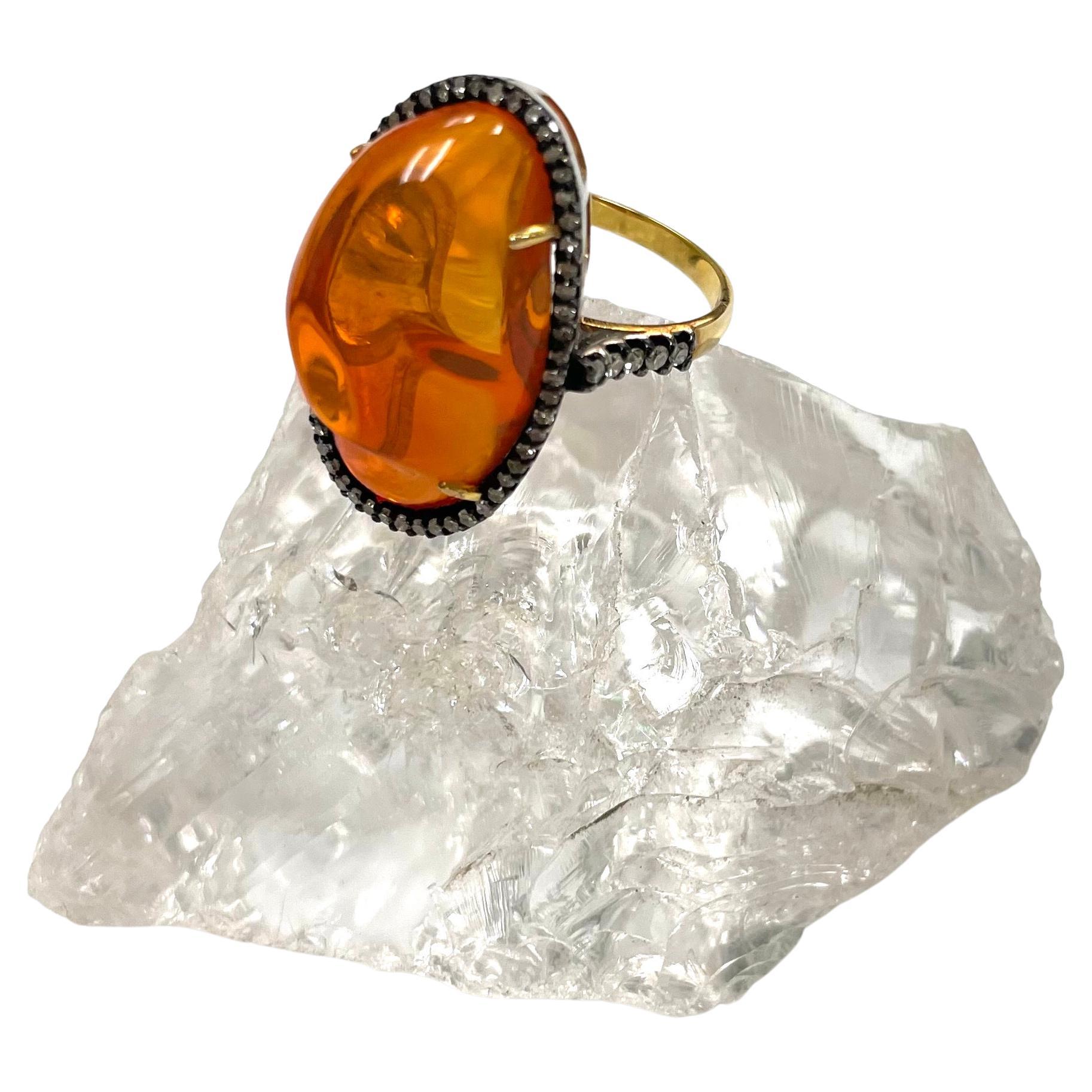 diamond and orange opal ring