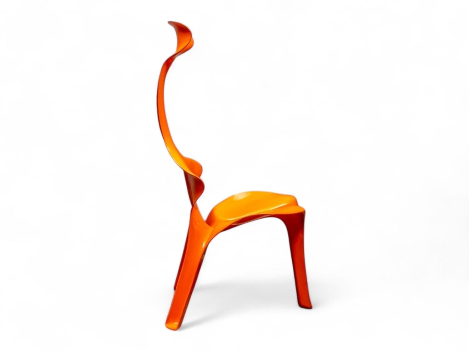 The Floris Chair (ca. 1967) by Günter Beltzig is a landmark of 1960s radical design, showcasing the era’s experimental approach to form and function. Made from orange lacquered polyester, its anthropomorphic shape challenges traditional seating