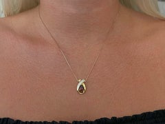 Orange Garnet and Diamond Two Toned Pendant and Chain in 14k Gold