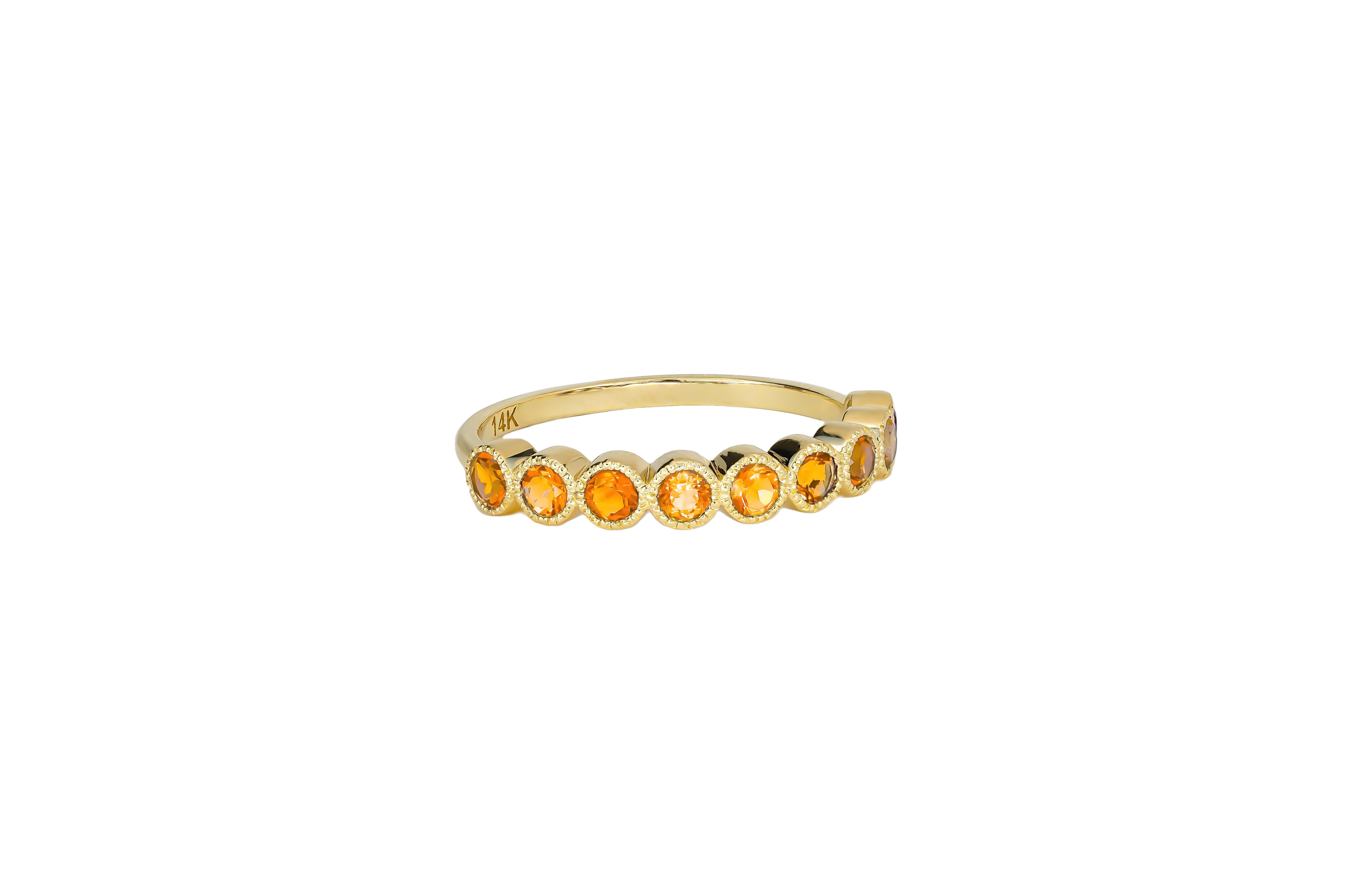 in vendita:  Anello mezza eternità con gemma arancione in oro 14k 2