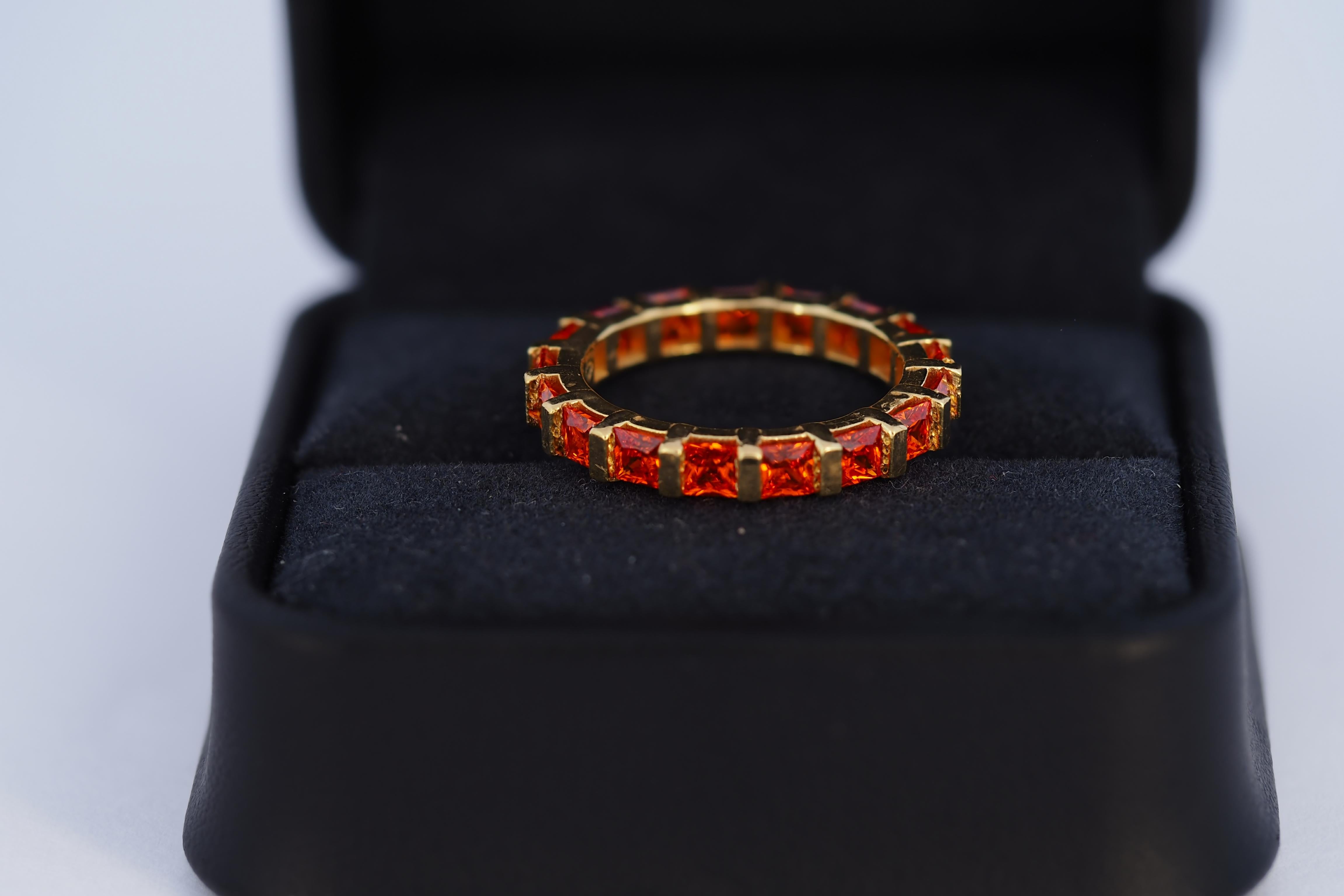 For Sale:  Orange gemstone 14k gold eternity ring band. 7