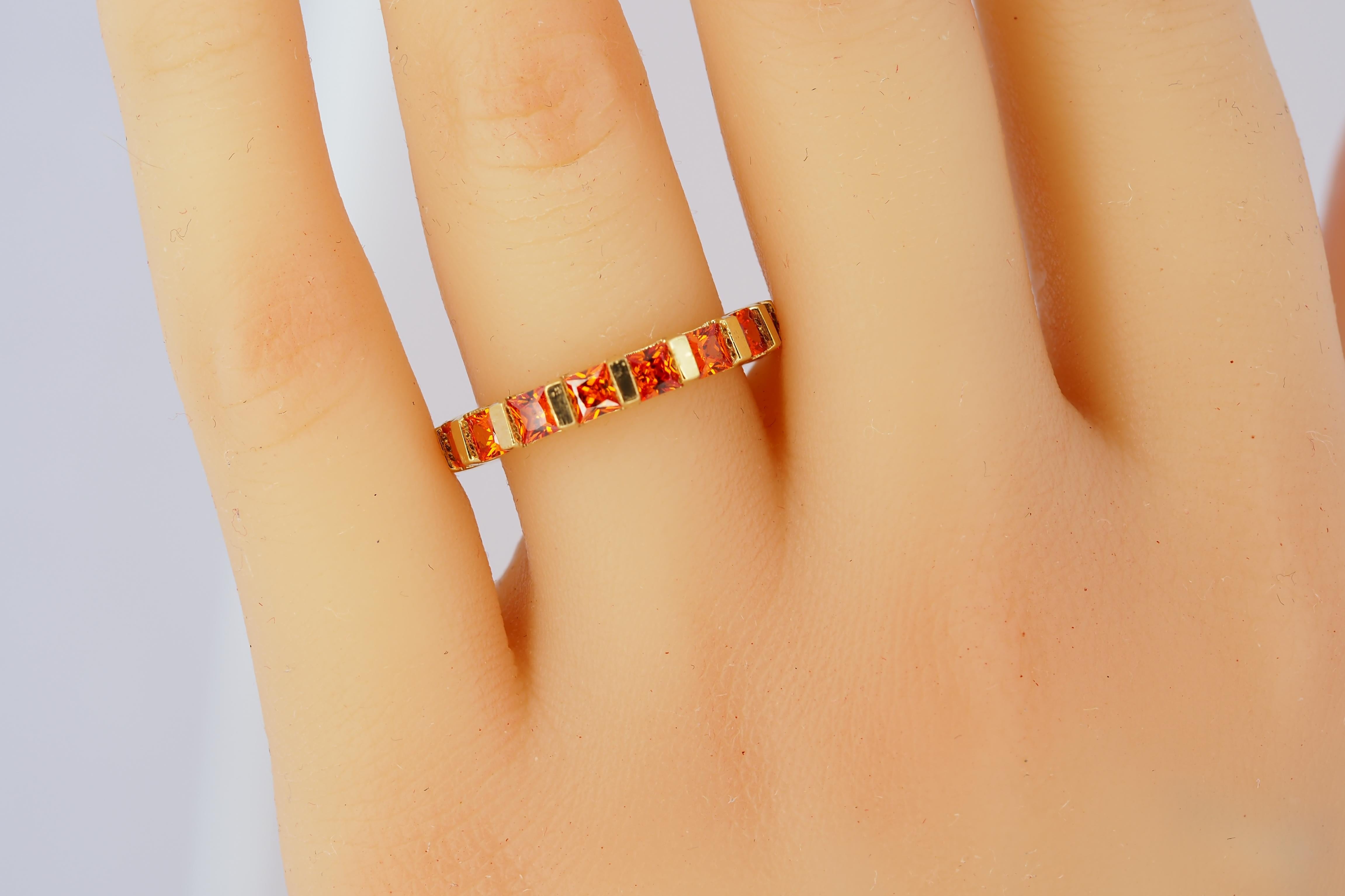 For Sale:  Orange gemstone 14k gold eternity ring band. 8