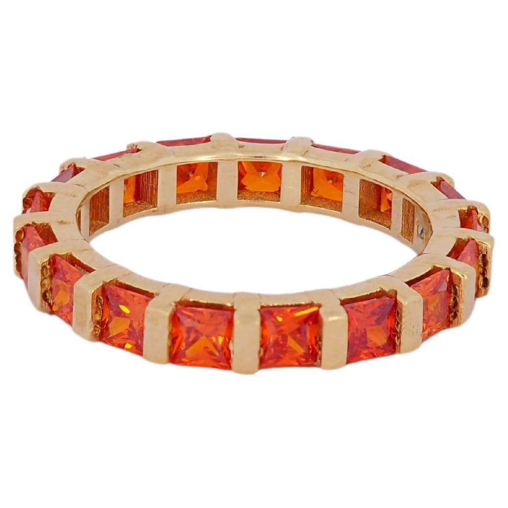 For Sale:  Orange gemstone 14k gold eternity ring band.