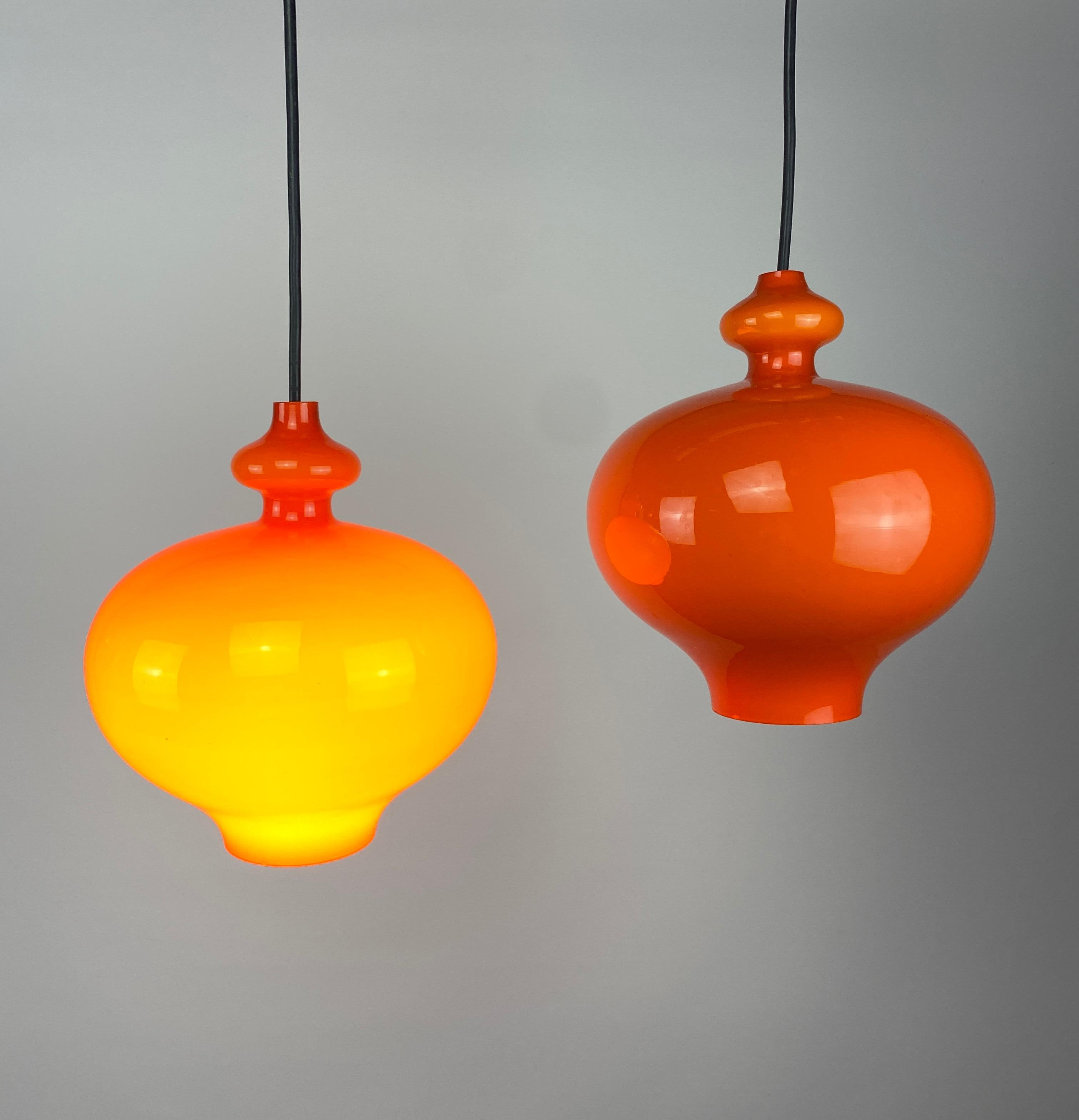 Beautiful Swedish design by Hans Agne Jakobsson made by AB Markaryd and sold by Staff Leuchten. Model is called Oplight and is produced around 1960. Has a nice bright orange color and gives a very warm light. Price per light. 

Dimensions
Height:
