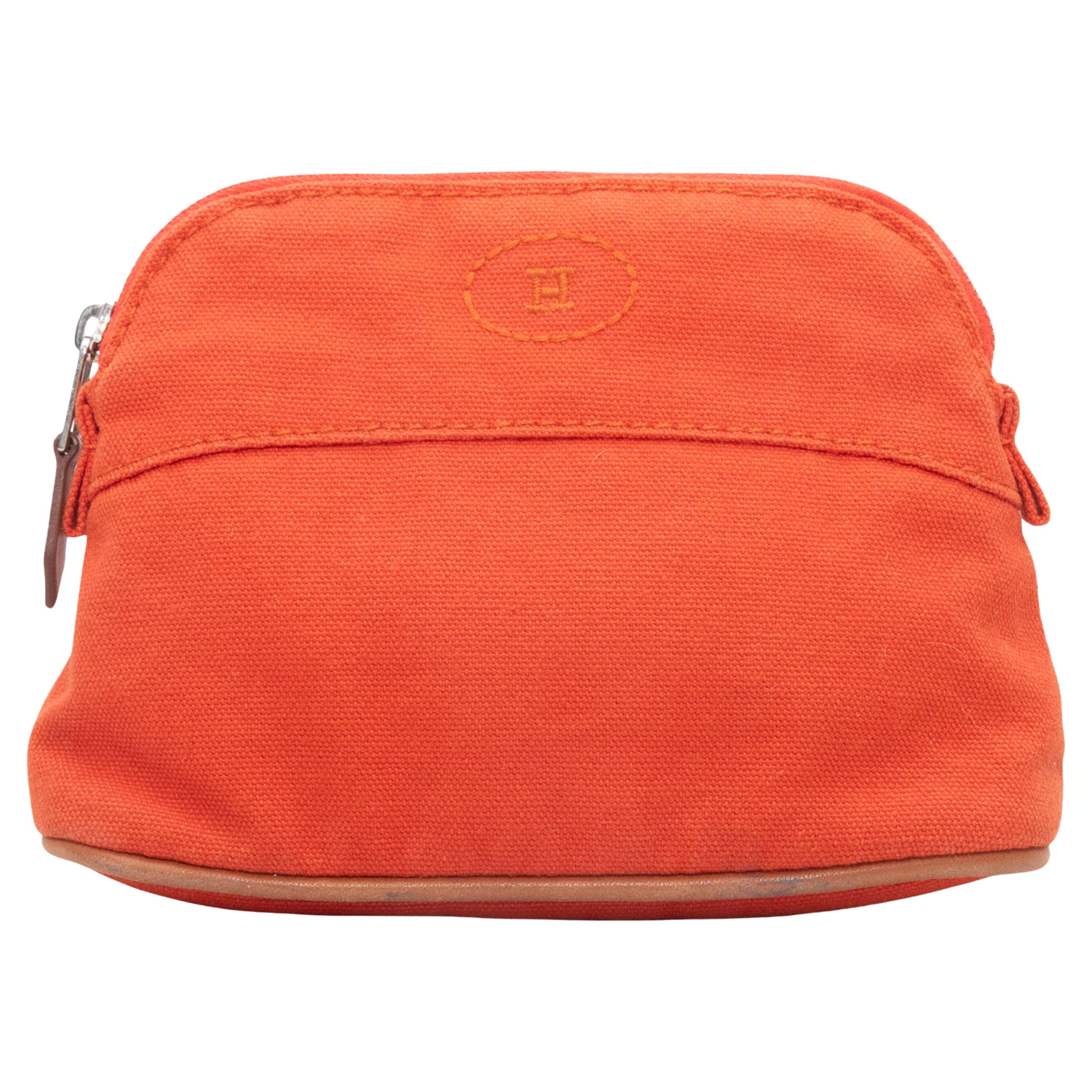 Mini pochette cosmétique Hermes orange en vente