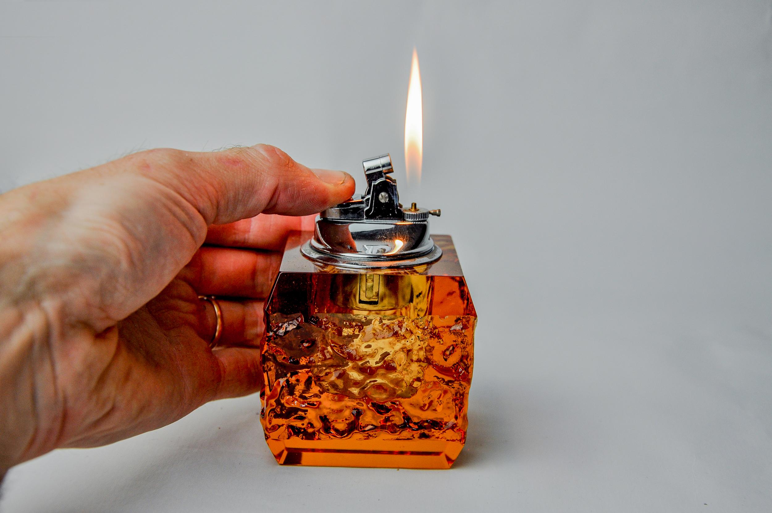 Superb and rare ice lighter designed and produced by antonio imperatore in italy in the 1970s. Orange frosted effect murano glass lighter handcrafted by venetian master glassmakers. Decorative object that will bring a real design touch to your