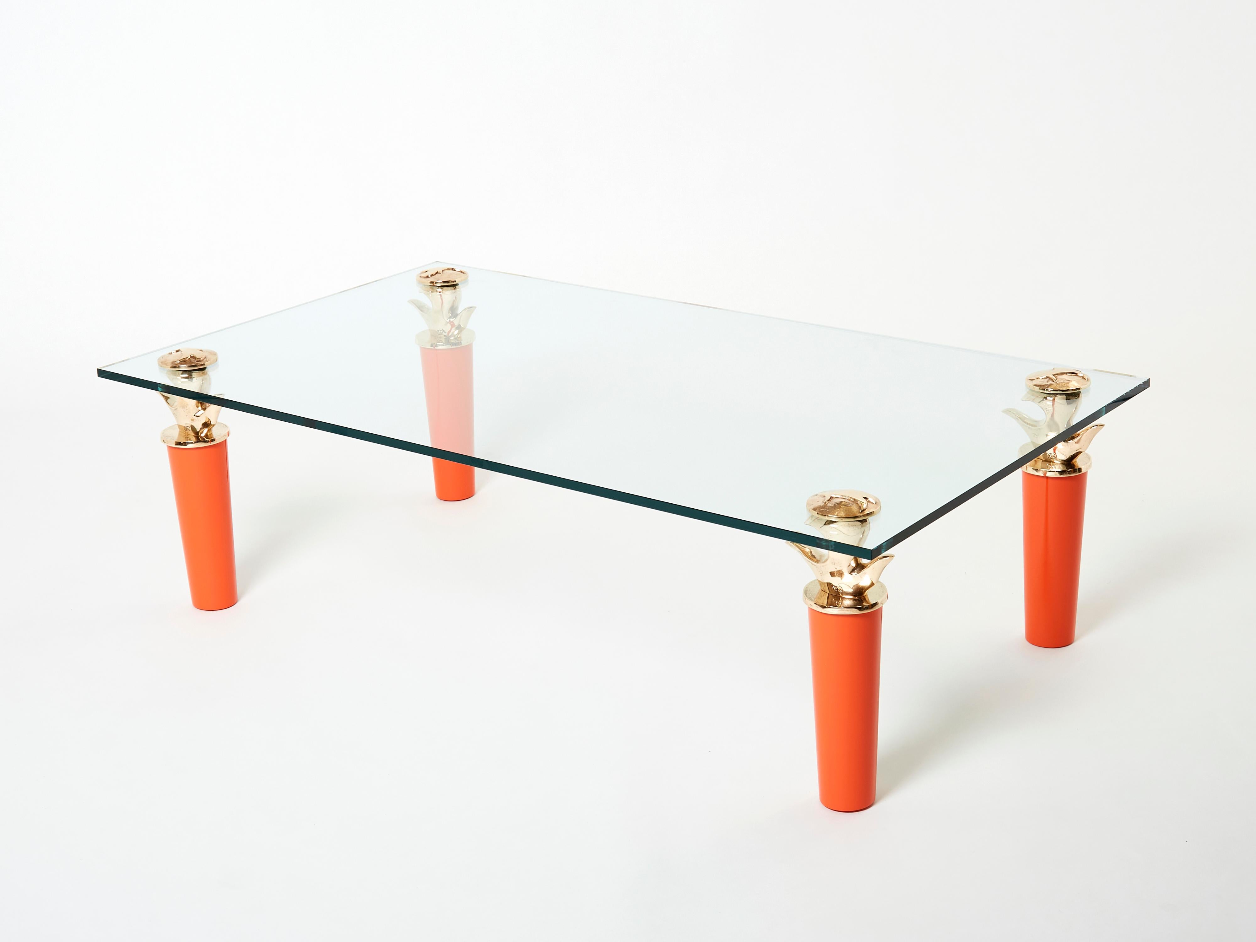 Rare signed coffee table by Elizabeth Garouste & Mattia Bonetti, model Concerto, designed and made in 1995 by the iconic duo. The large feet are made in beautiful orange lacquered wood topped by gilt bronze elements, all stamped BG. This is clearly