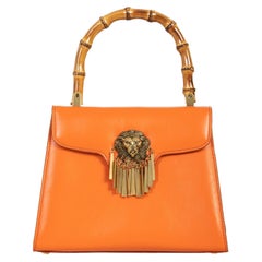 Orange leather bamboo handle shoulder bag NWOT