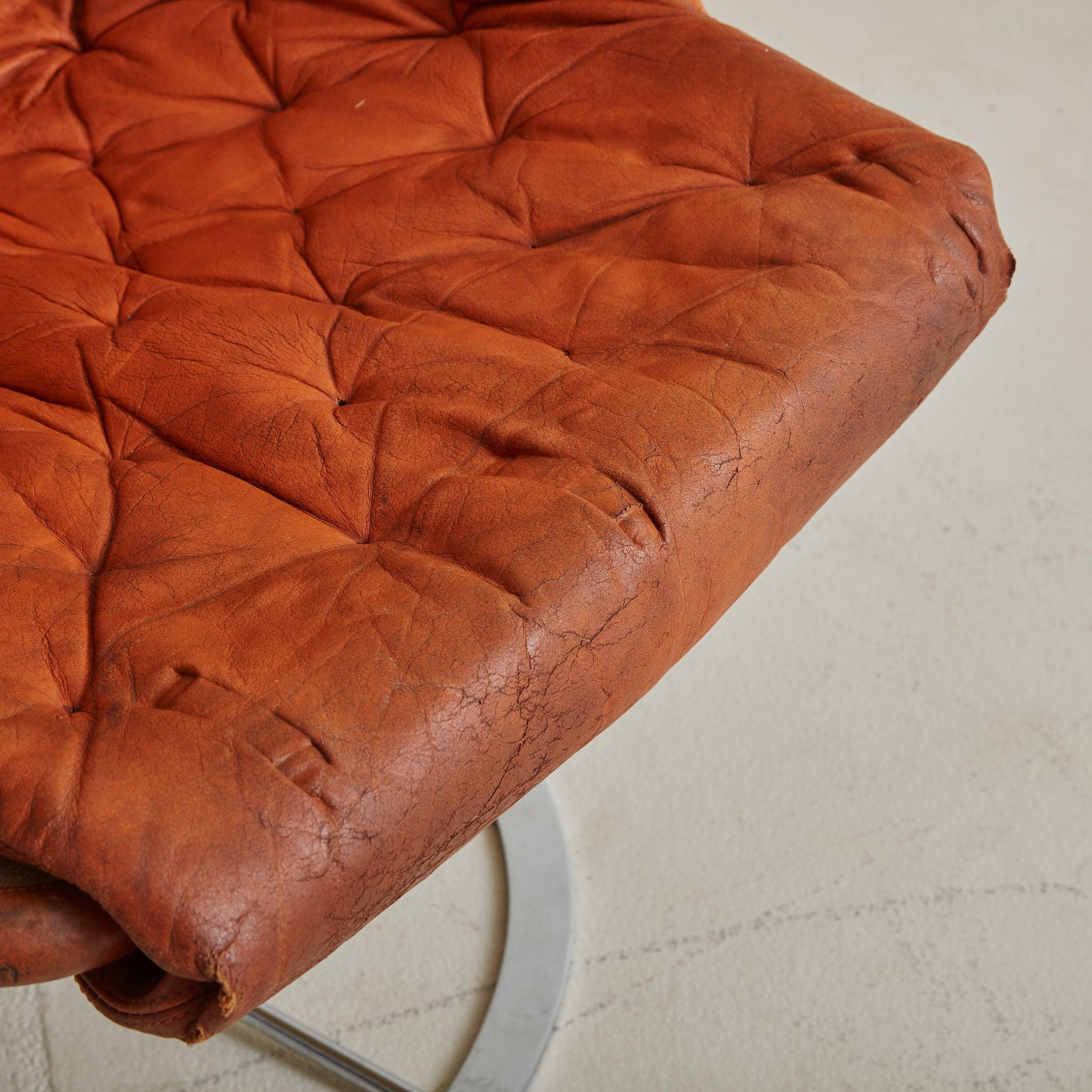 Swedish Orange Leather + Chrome 'Jetson' Swivel Lounge Chair by Bruno Mathsson for DUX For Sale