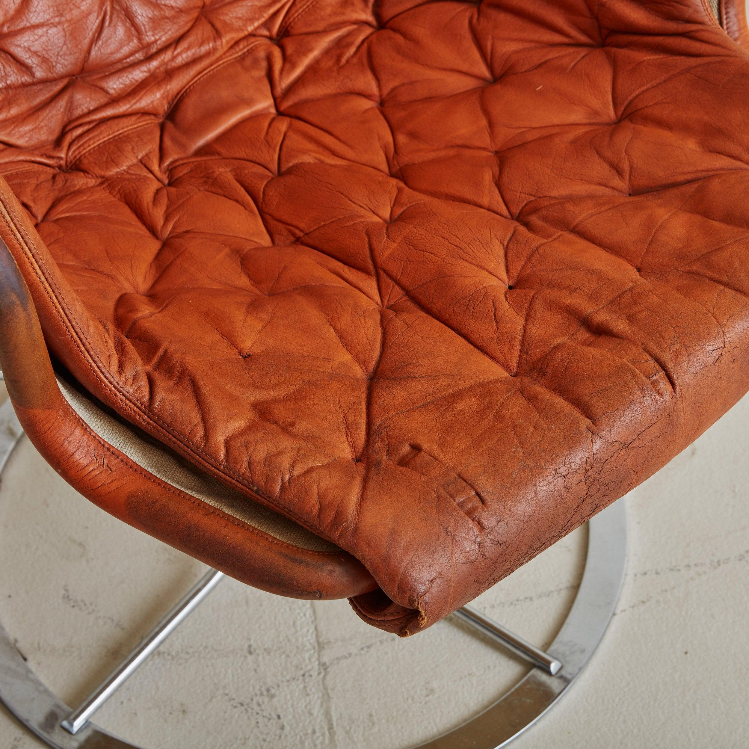 Orange Leather + Chrome 'Jetson' Swivel Lounge Chair by Bruno Mathsson for DUX In Good Condition For Sale In Chicago, IL
