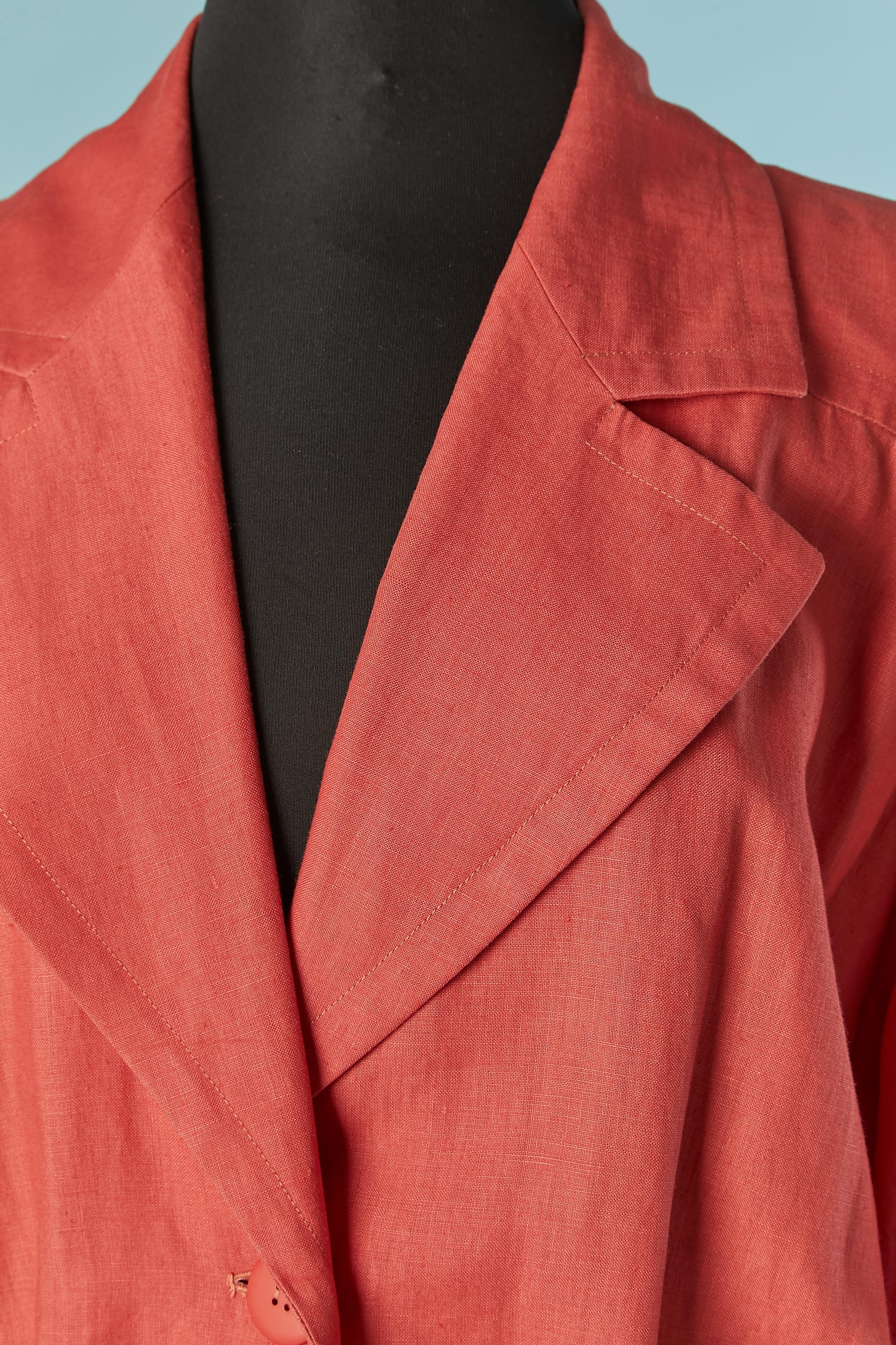 Orange linen day dress. Button and buttonhole closure on the middle front and on pocket . 
SIZE 46 (Fr) 14 (Us) L/XL