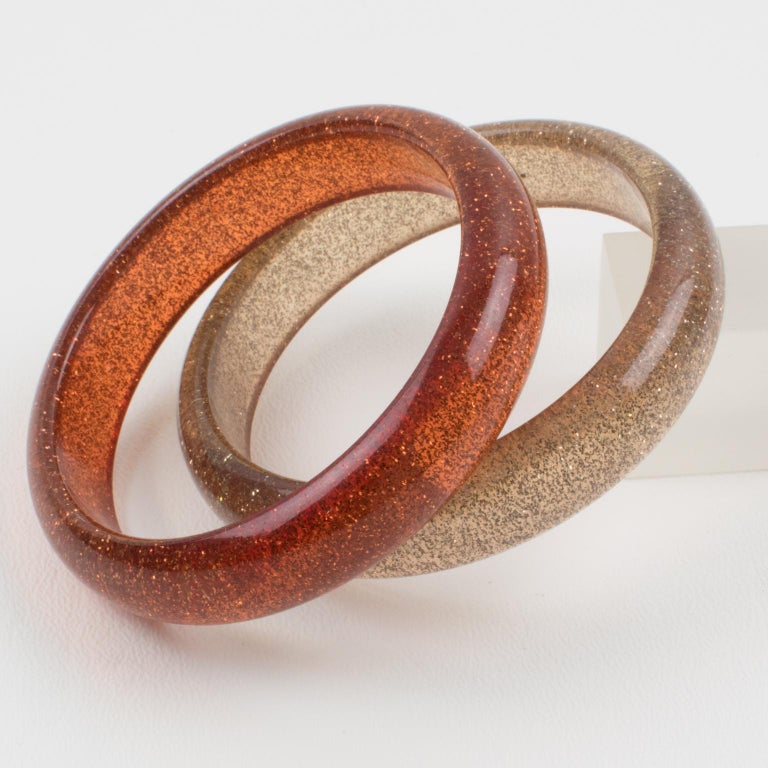 Orange Lucite Bracelet Bangle with Metallic Confetti Inclusions, a pair For Sale at 1stDibs