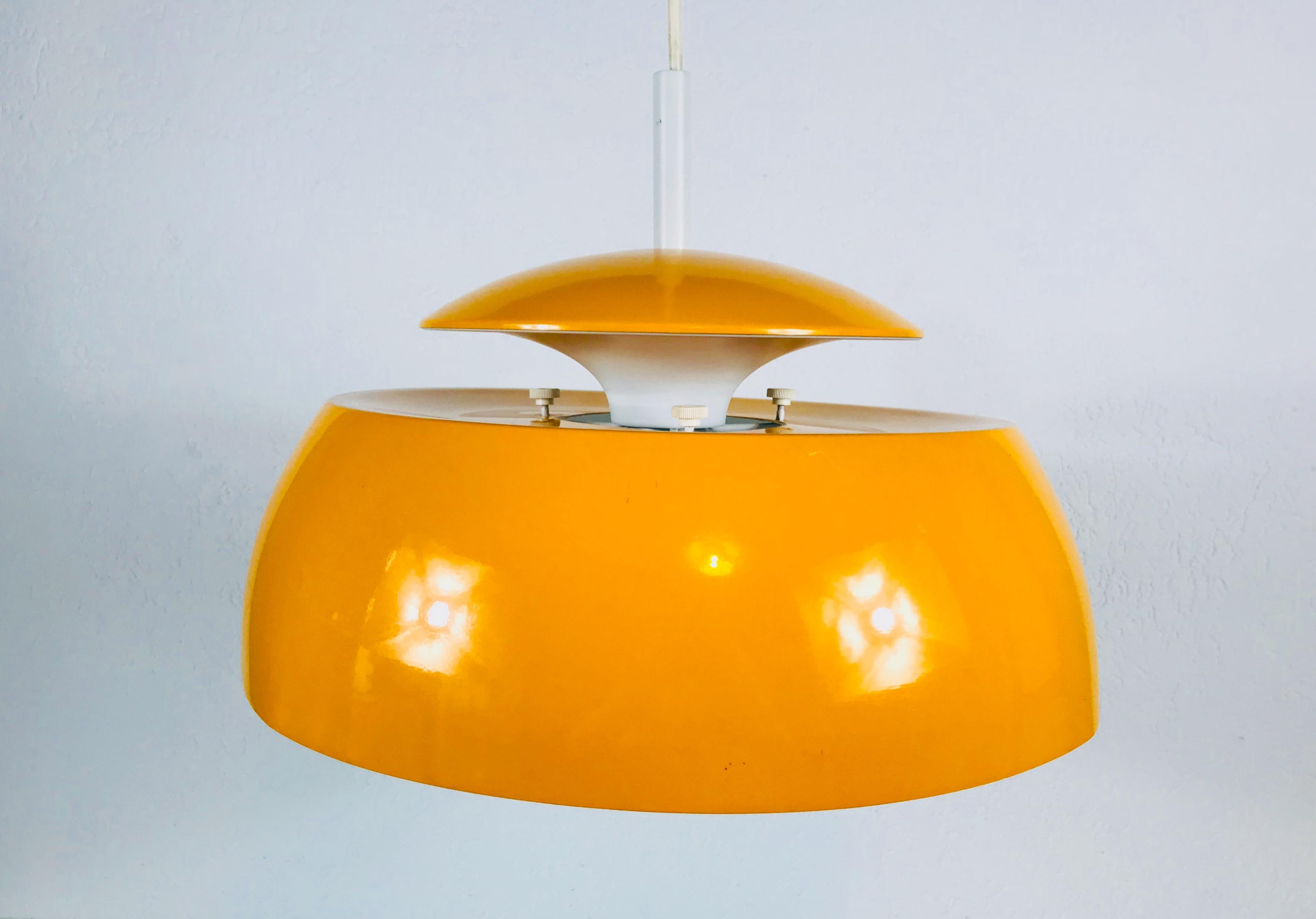 Late 20th Century Orange Metal Pendant Lamp by Temde, 1970s For Sale