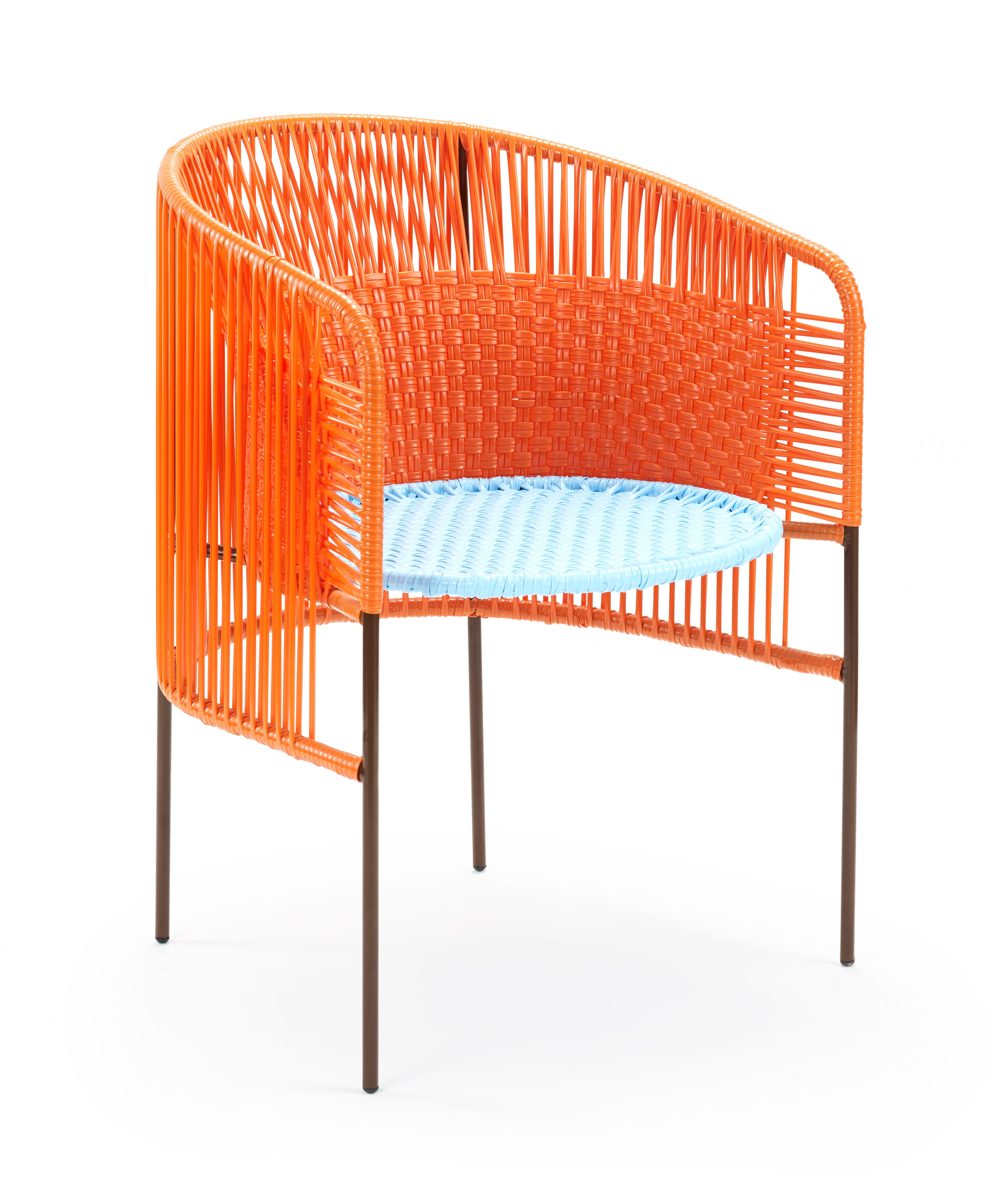 Orange mint caribe dining chair by Sebastian Herkner
Materials: Galvanized and powder-coated tubular steel. PVC strings are made from recycled plastic.
Technique: Made from recycled plastic and weaved by local craftspeople in Colombia.