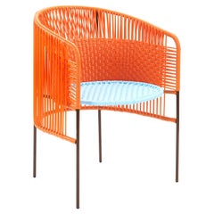 Chaise de salle à manger Caribe orange menthe de Sebastian Herkner
