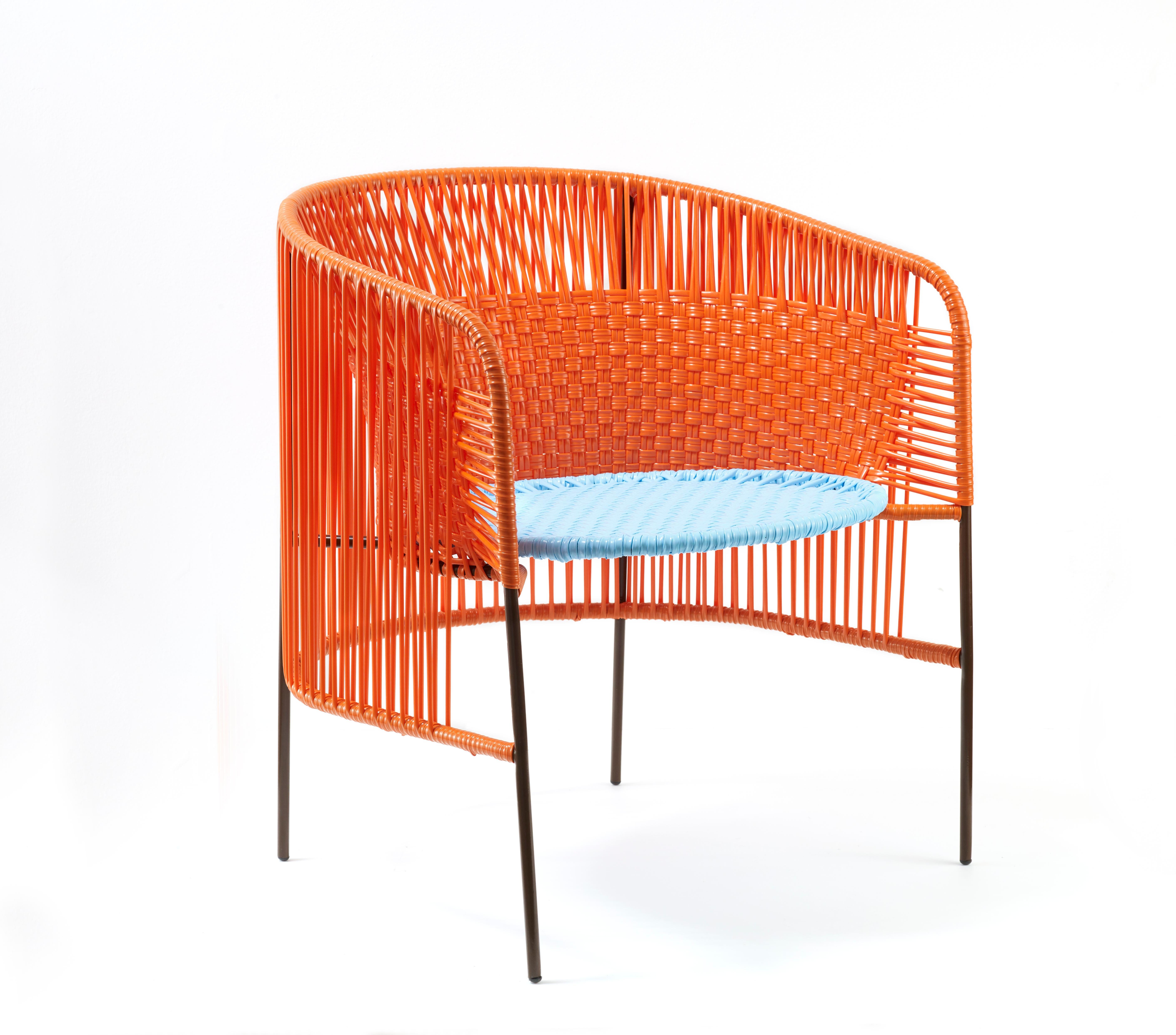 Orange Mint caribe lounge chair by Sebastian Herkner
Materials: Galvanized and powder-coated tubular steel. PVC strings are made from recycled plastic.
Technique: Made from recycled plastic and weaved by local craftspeople in Colombia.