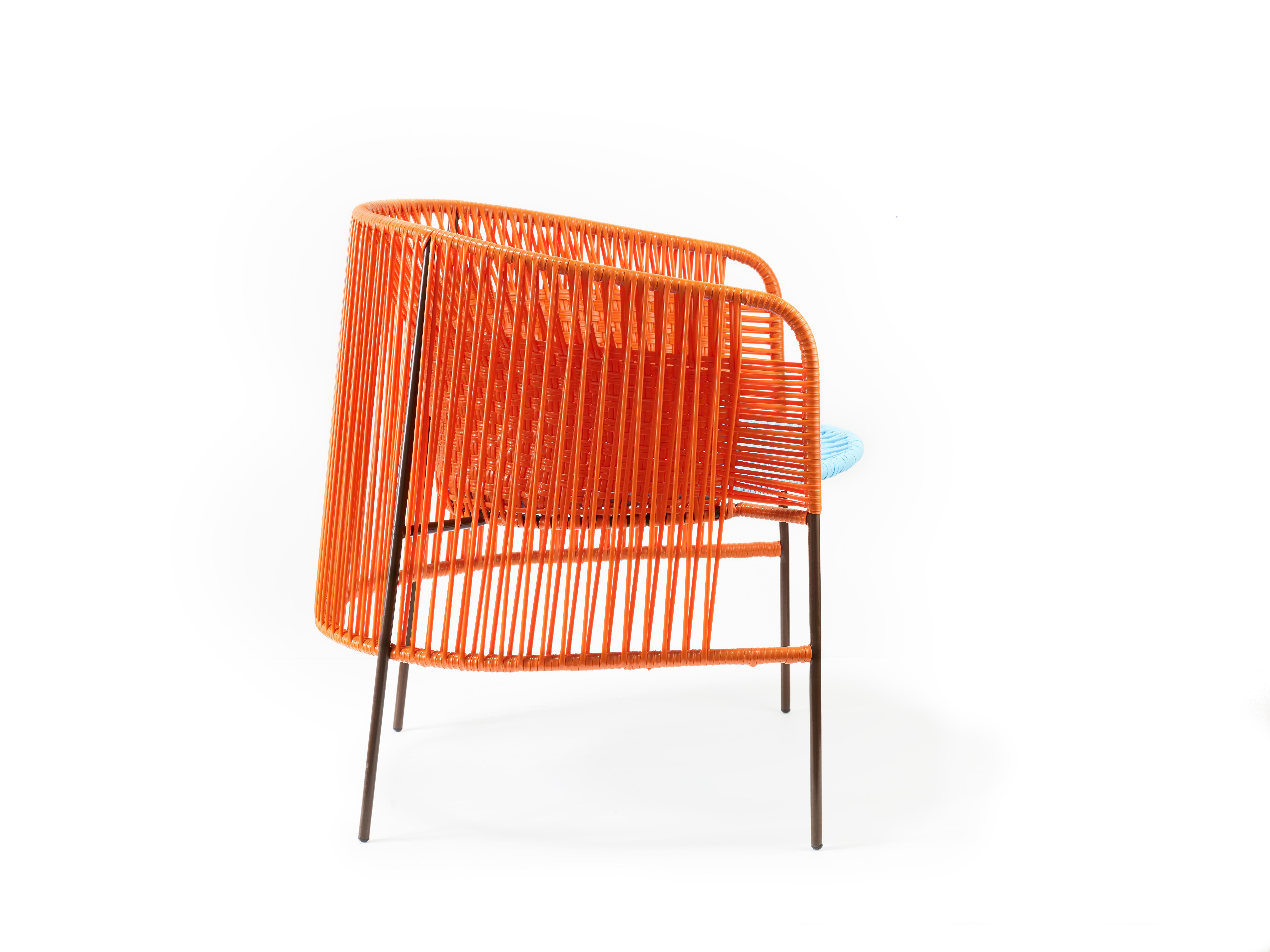 German Orange Mint Caribe Lounge Chair by Sebastian Herkner