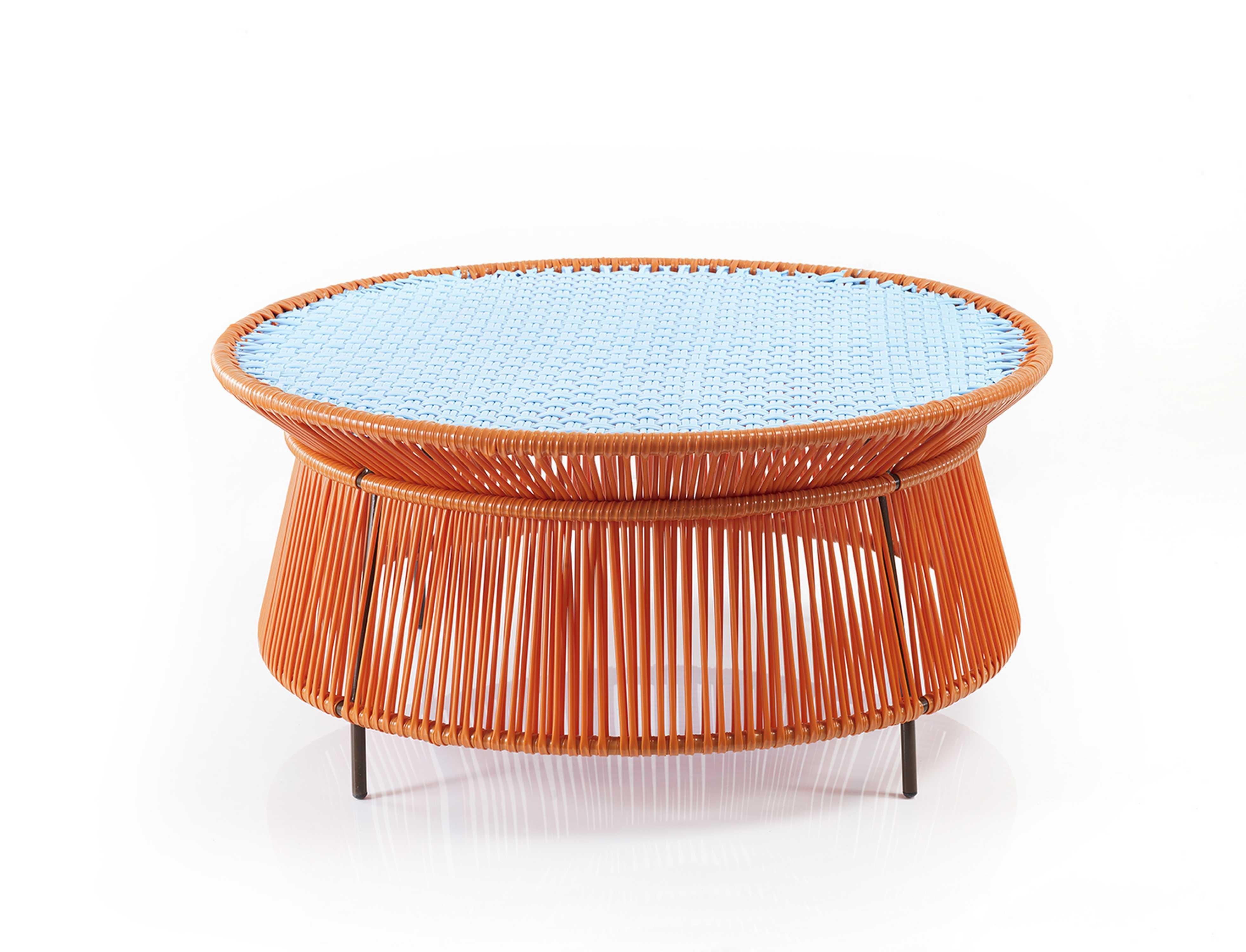 Orange mint caribe low table by Sebastian Herkner
Materials: Galvanized and powder-coated tubular steel. PVC strings are made from recycled plastic.
Technique: Made from recycled plastic and weaved by local craftspeople in Colombia. 
Dimensions: