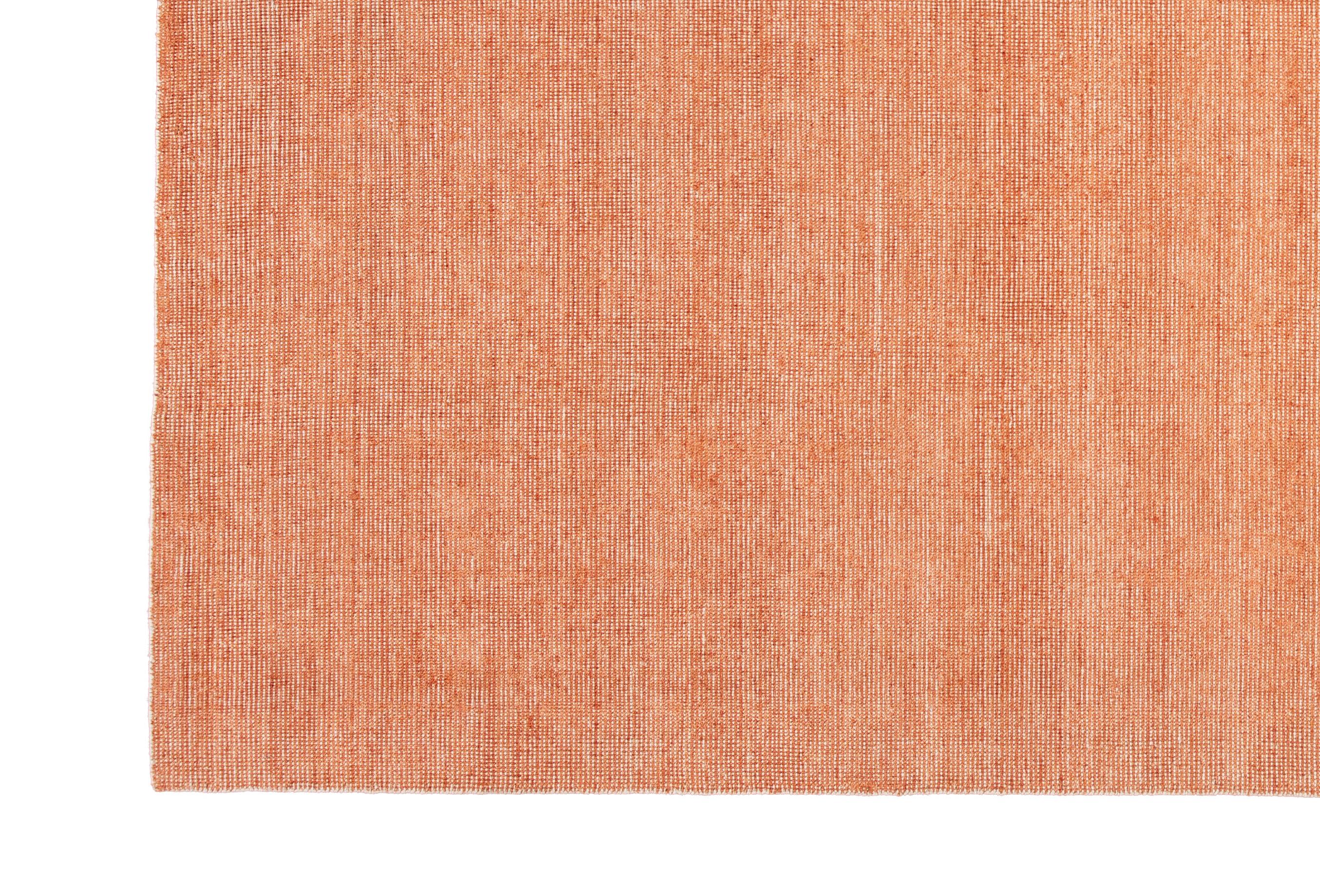 Beautiful modern handmade Indian bamboo and silk boho rug with an orange and ivory field. This boho collection rug has an all-over solid design.

This rug measures: 10'0