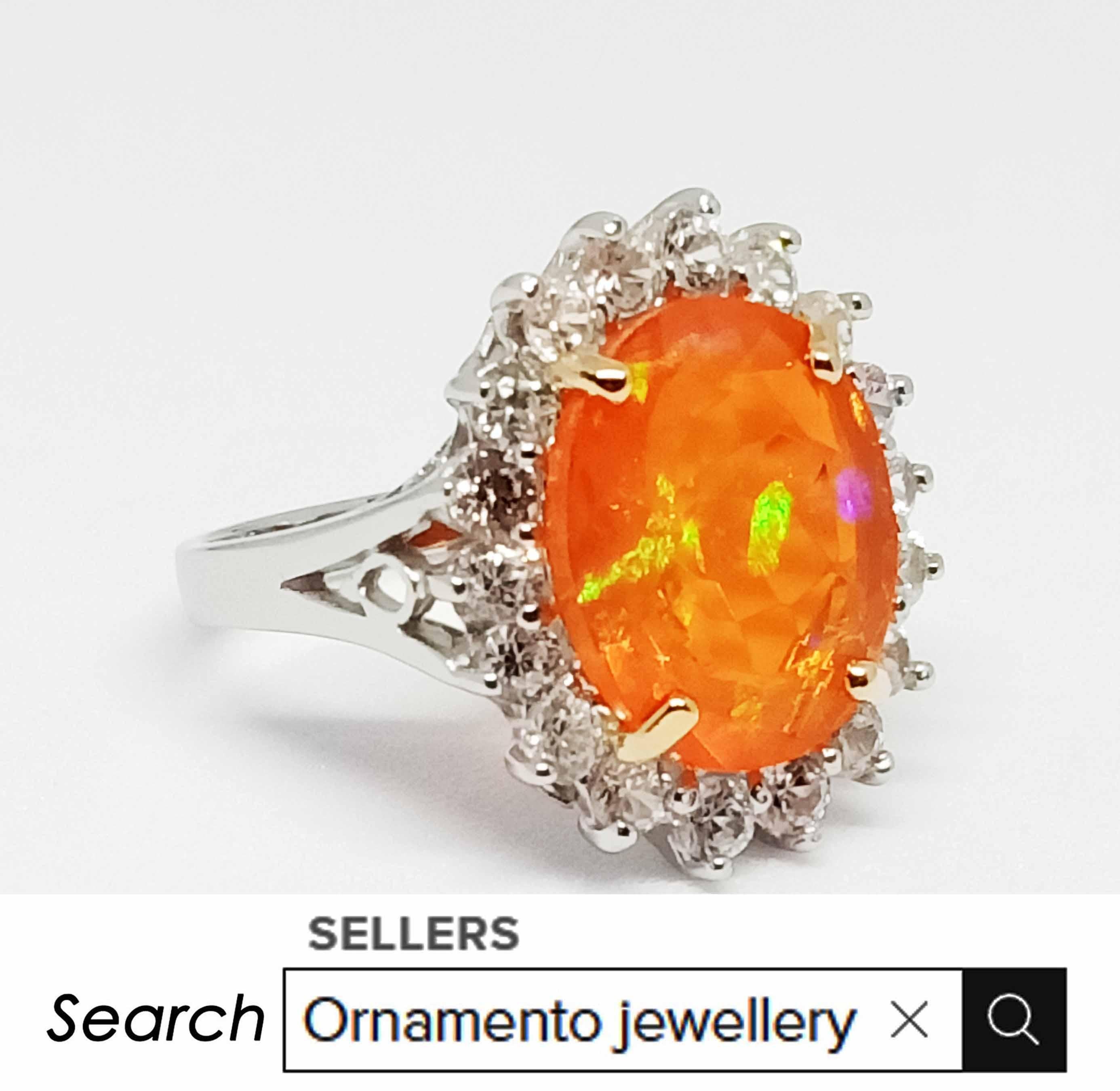 Contemporary (Big Ring)Orange Opal(5.30cts) white gold plated Over sterling silver.