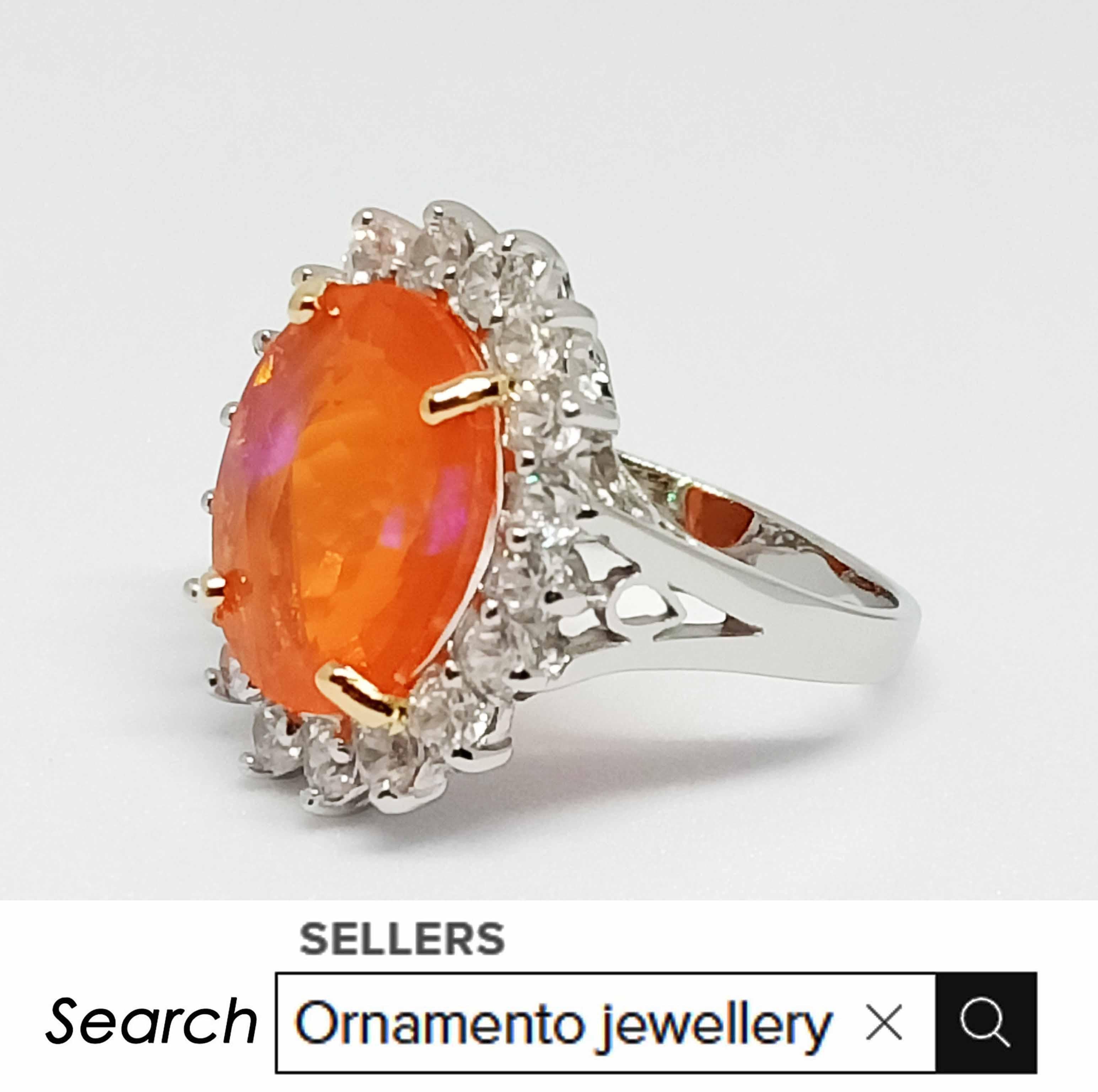 Oval Cut (Big Ring)Orange Opal(5.30cts) white gold plated Over sterling silver.