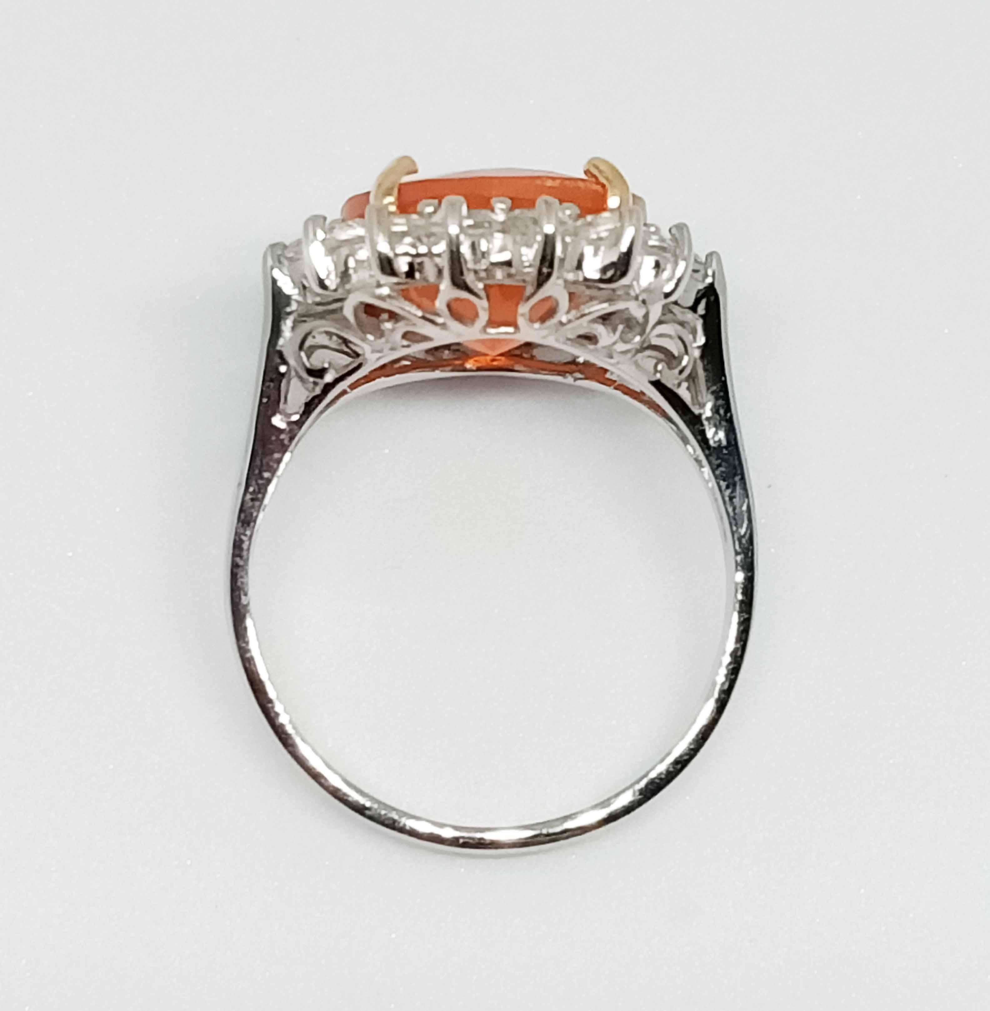 Women's (Big Ring)Orange Opal(5.30cts) white gold plated Over sterling silver.