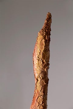 Orange painted iron sculpture by Mario Brunelli