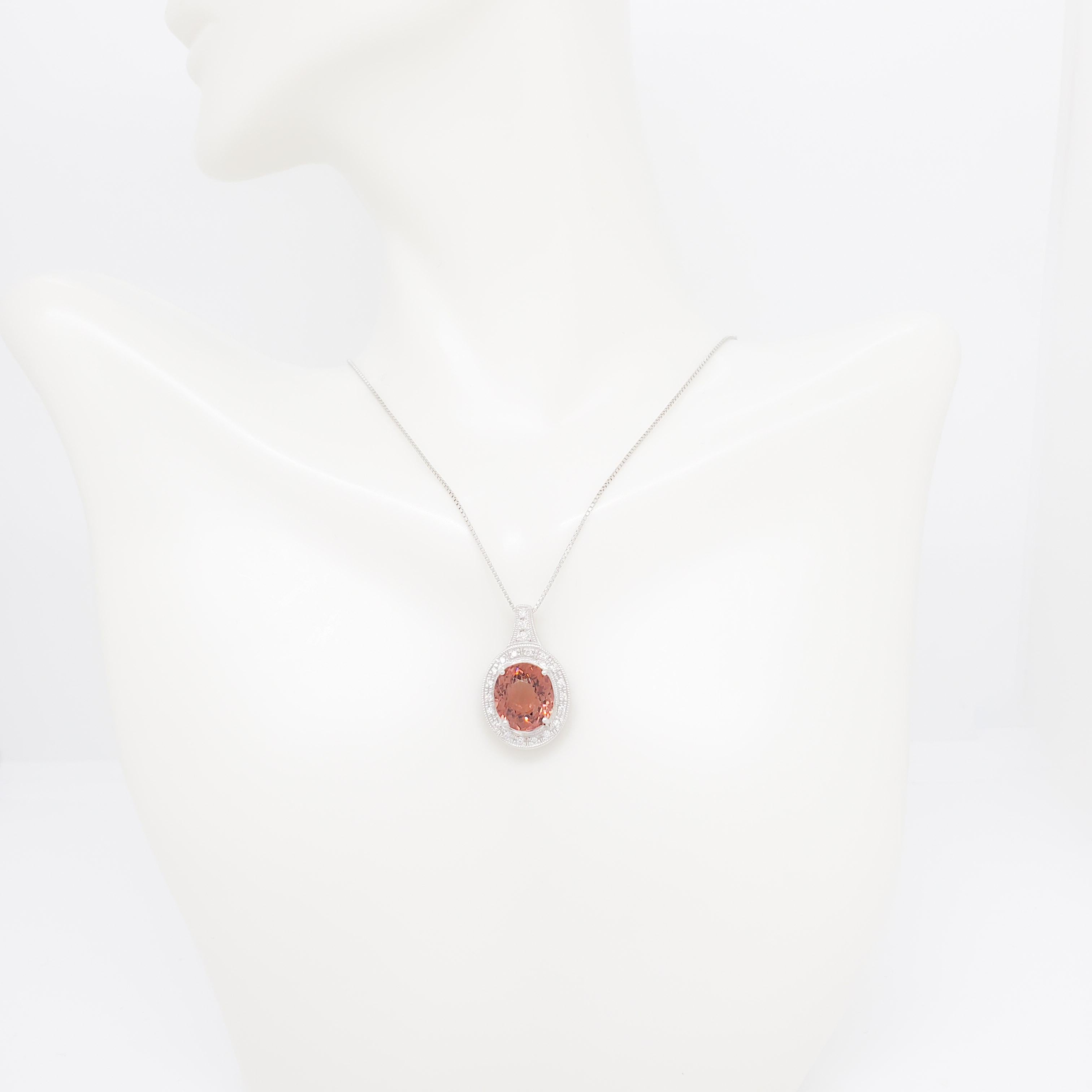 Oval Cut Orange Pink Tourmaline and Diamond Pendant Necklace in Platinum For Sale