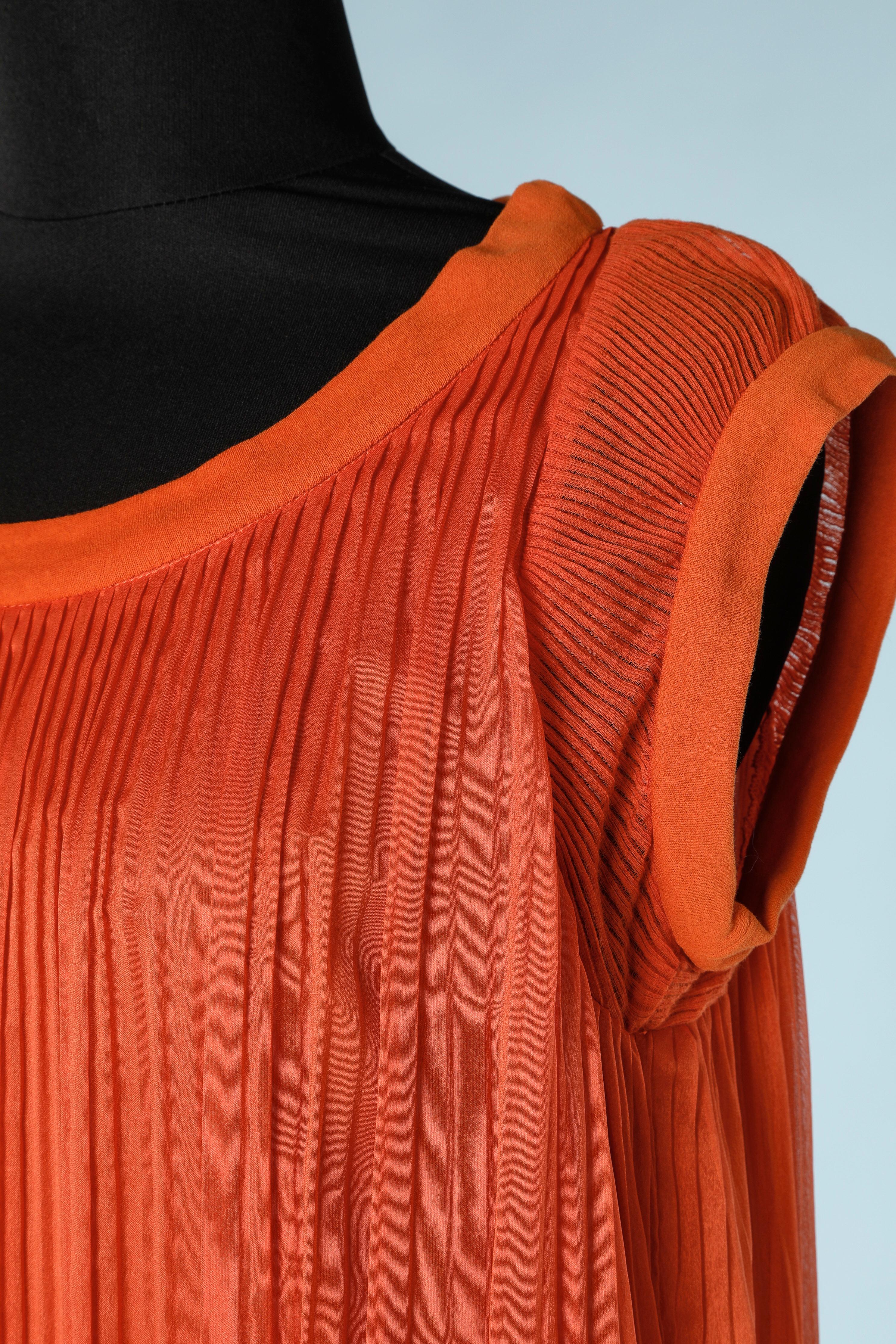 Orange pleated dress in silk 