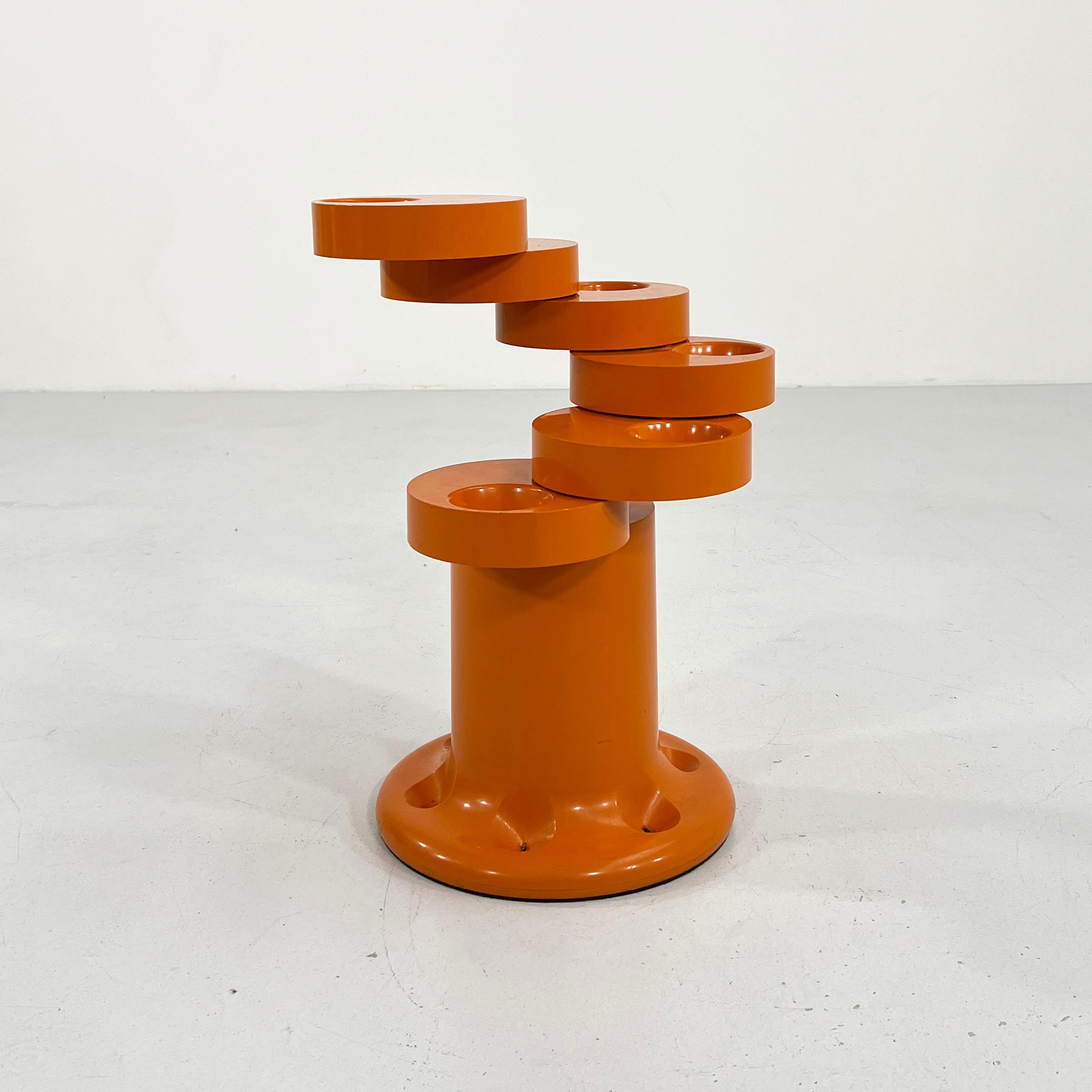 Designer - Giancarlo Piretti
Producer - Anonima Castelli
Model - Pluvium Umbrella Stand
Design Period - Seventies
Measurements - width 30 cm x depth 30 cm x height 50 cm
Materials - Metal, Plastic
Color - Orange

Condition - Good 
Comments