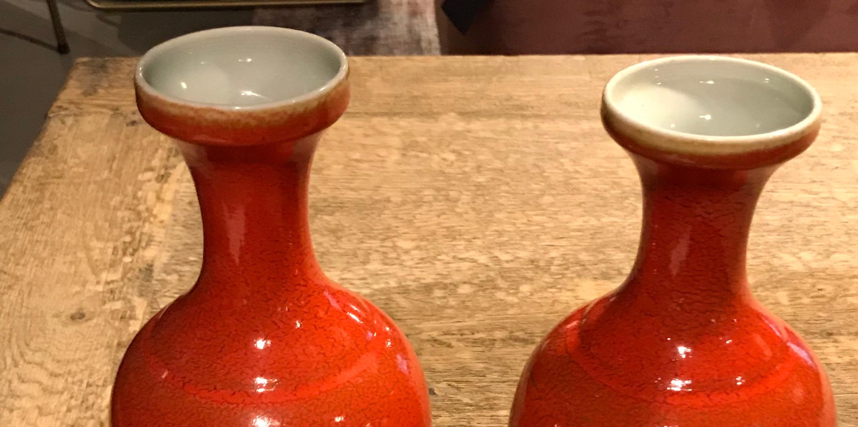 Contemporary Chinese orange glazed thin necked porcelain vase
Two are available
Sits nicely with S5125.