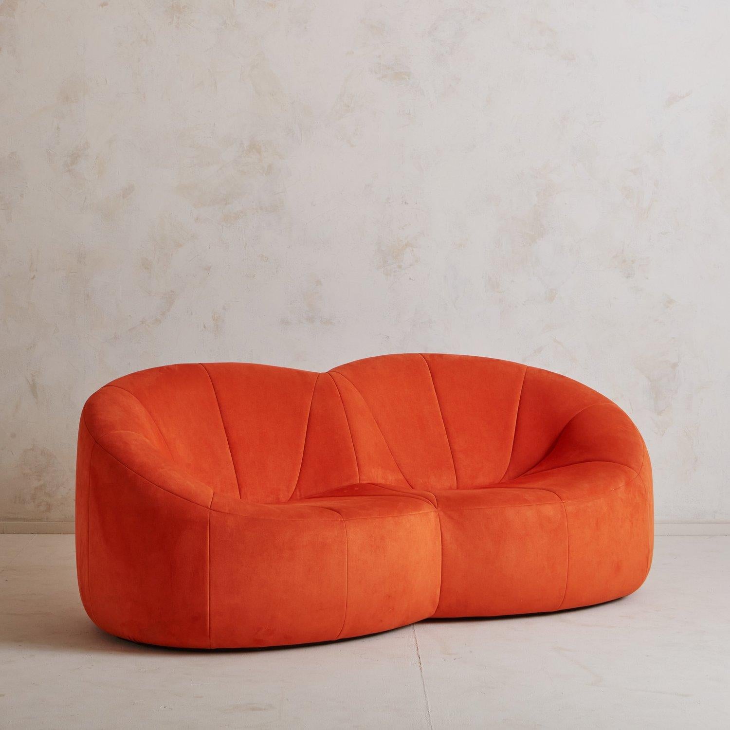An iconic pumpkin sofa designed by Pierre Paulin in 1971 and produced in France by Alpha. This iconic sofa retains its original orange suede upholstery and ‘Pierre Paulin Designer - Made in France’ tag on the seat back. Sourced in France.

This
