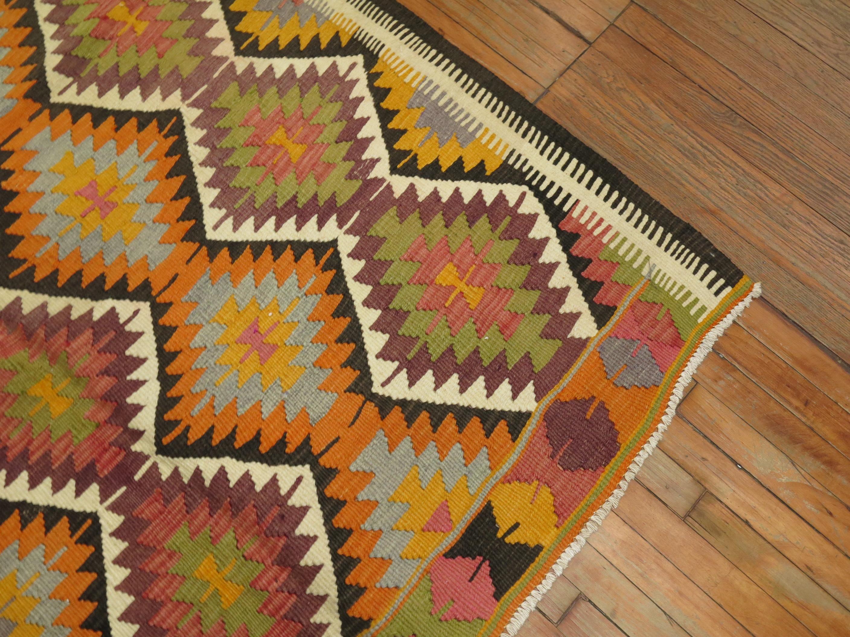 Hand-Knotted Orange Purple Pink Yellow Accent Vintage Turkish Kilim For Sale