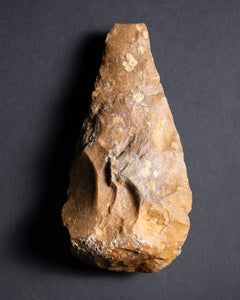 Orange Quartzite Palaeolithic Hand Axe made by Early Humans