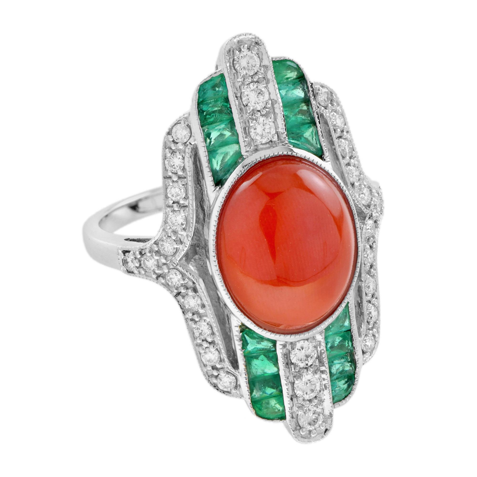 Simply beautiful and finely detailed cocktail ring center securely set with a 3.75 carat oval cabochon coral accented by French cut emerald and diamond. The perfect accessory for the modern woman! Ready to wear from day to evening with style and