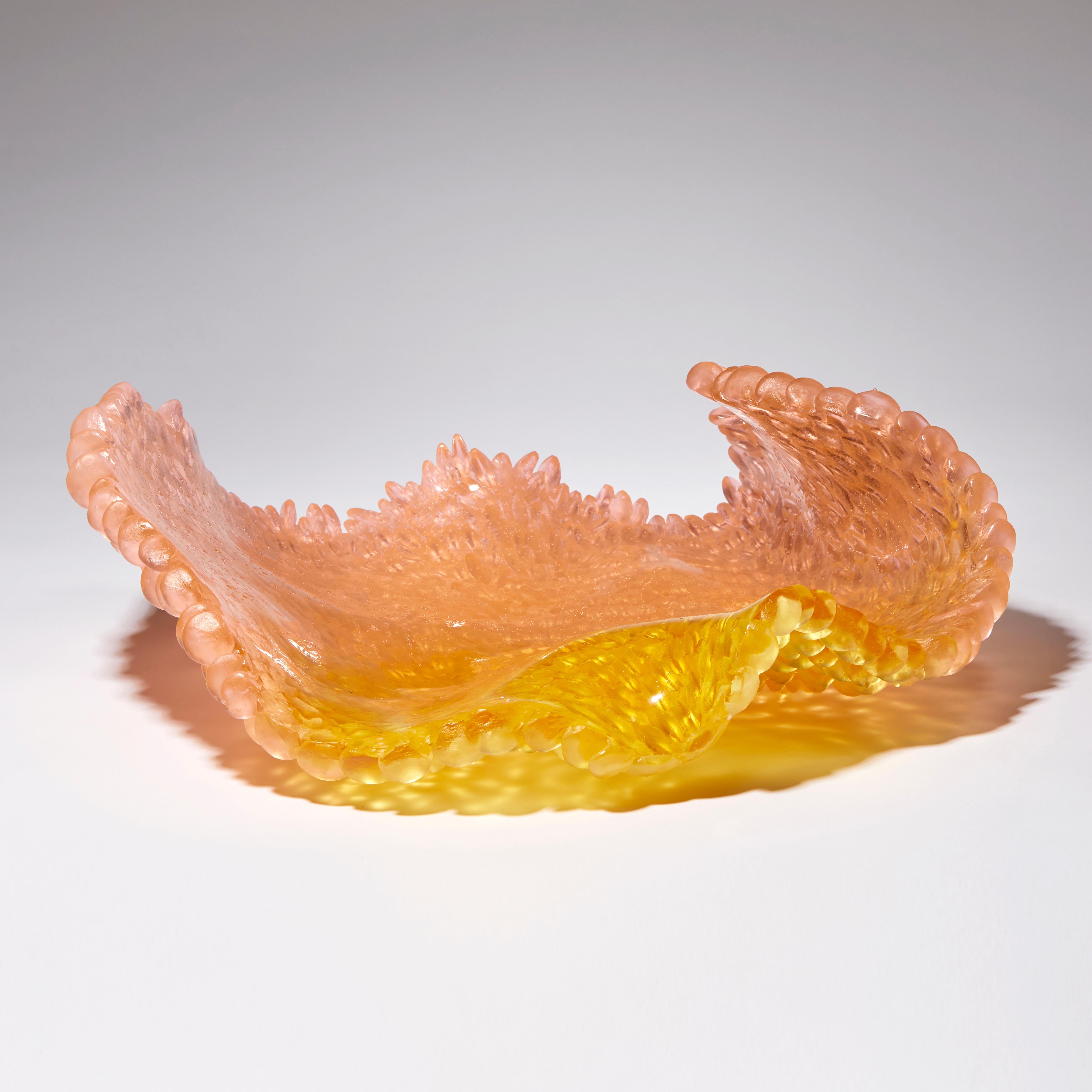 Orange rose is a unique textured glass sculpture in amber, gold and peach by the British artist Nina Casson McGarva.

Casson McGarva firstly casts her glass in a flat mould where she introduces all of the beautifully detailed, scaled surface