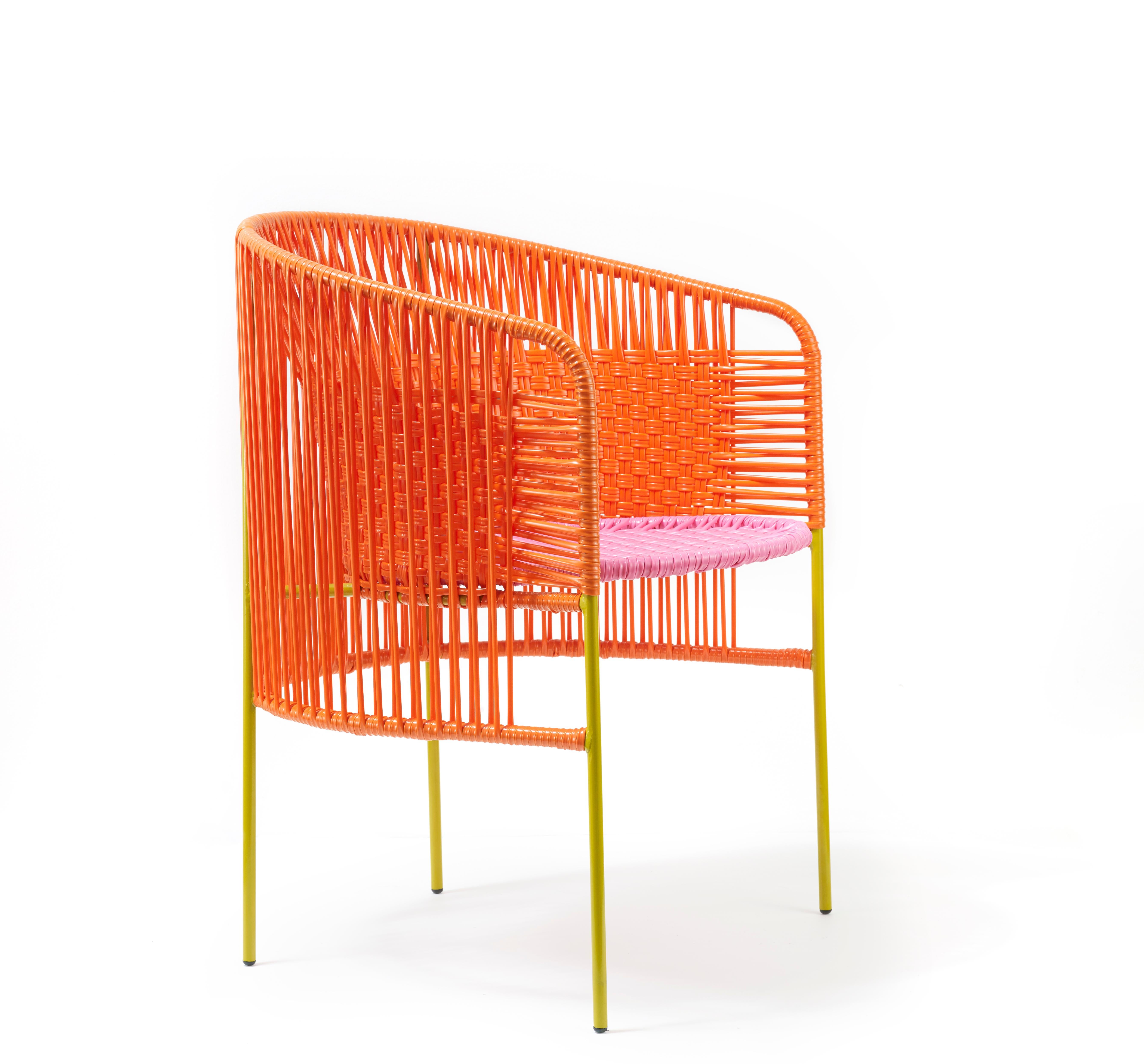 Orange rose caribe dining chair by Sebastian Herkner
Materials: Galvanized and powder-coated tubular steel. PVC strings are made from recycled plastic.
Technique: Made from recycled plastic and weaved by local craftspeople in Colombia.