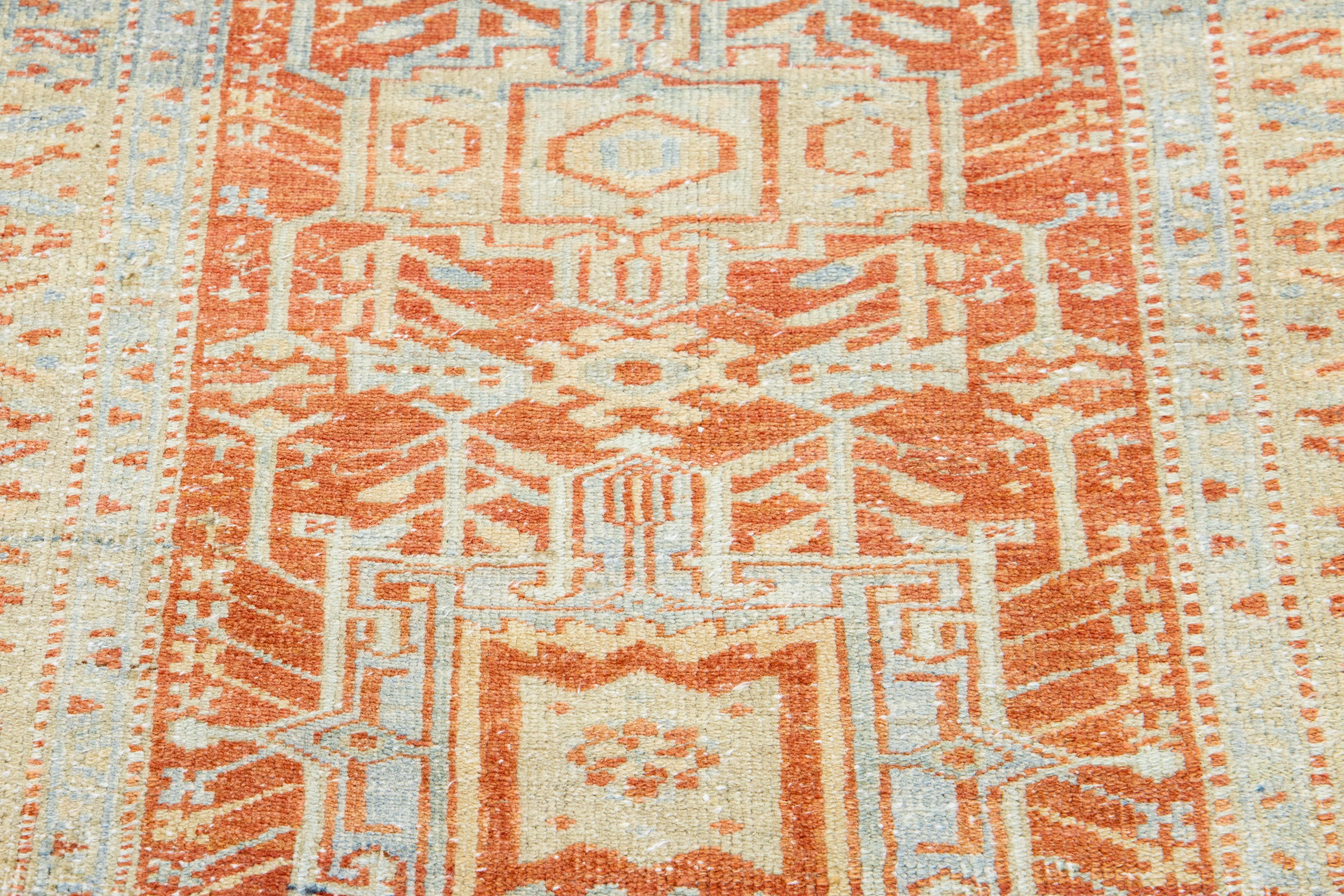 20th Century Orange Rust Antique Heriz Handmade Wool Runner Featuring an Allover Pattern For Sale
