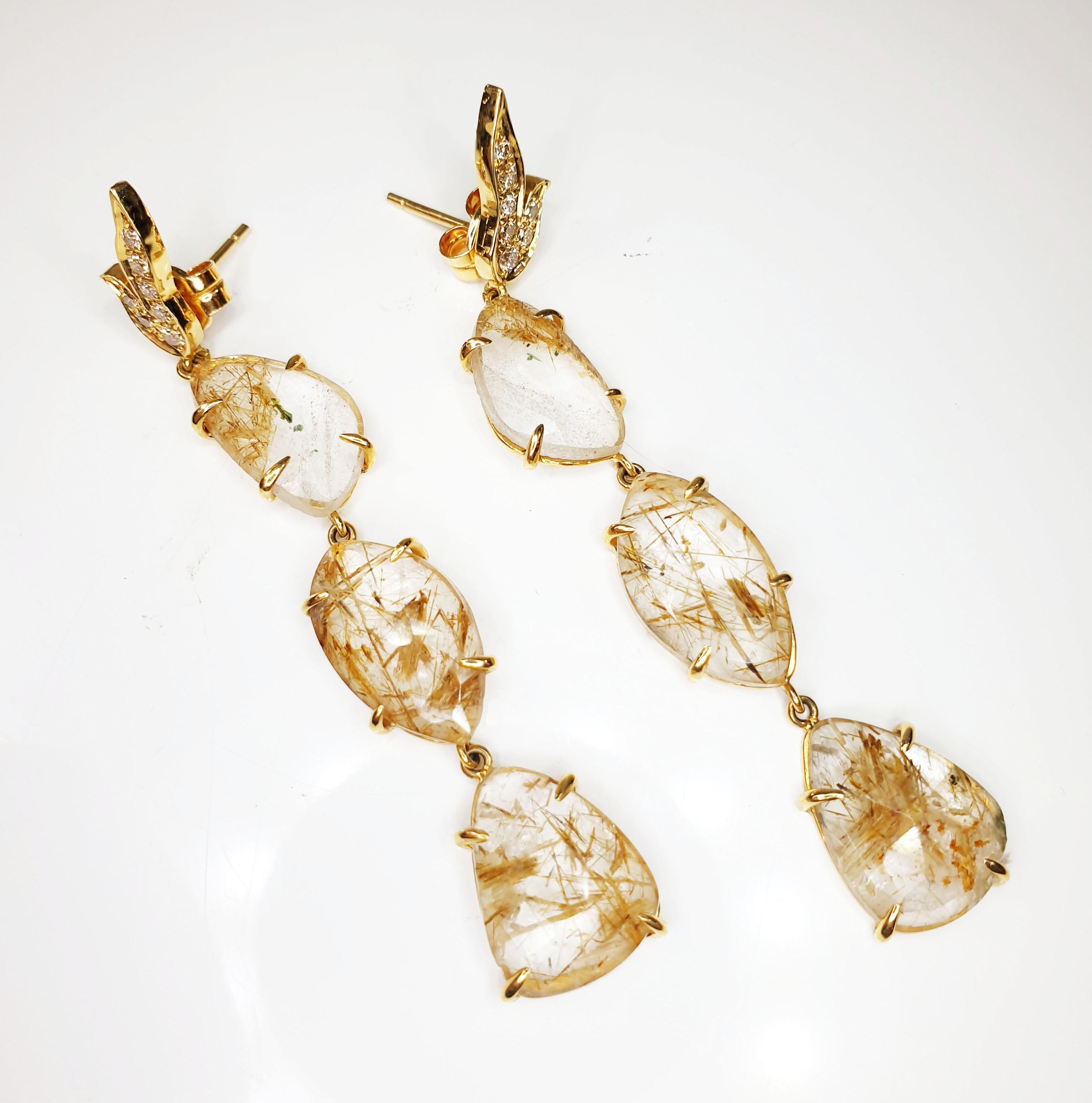 Rutiles leafs in 18k yellow gold and pavé of diamonds drop earrings 
Irama Pradera is a Young designer from Spain that searches always for the best gems and combines classic with contemporary mounting and styles.
Rutile, often referred throughout