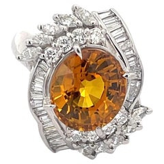 Platinring mit orangefarbenem Saphir 6,46 Karat und Diamant 1,16 Karat