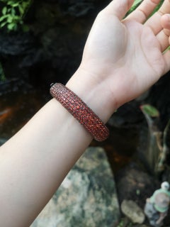 Orange Sapphire Bangle set in Silver Settings